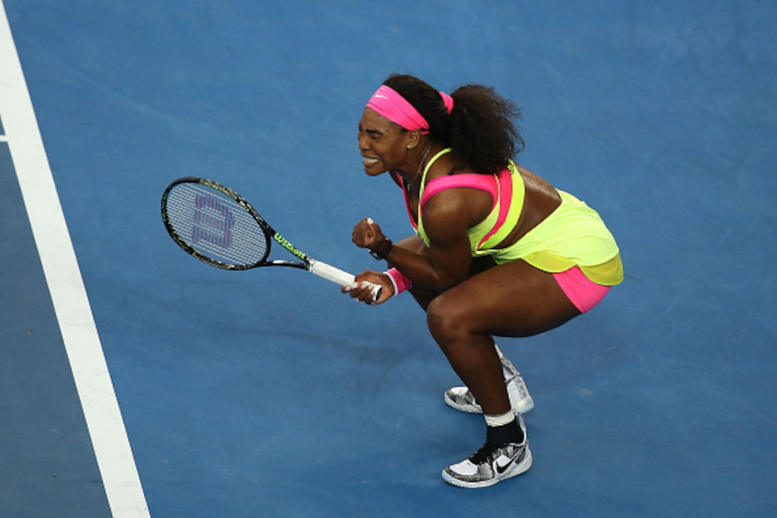 MELBOURNE, AUSTRALIA - JANUARY 20:  Serena Williams of the United States celebrates winning her first round match against Alison Van Uytvanck of Belgium during day two of the 2015 Australian Open at Melbourne Park on January 20, 2015 in Melbourne, Austral