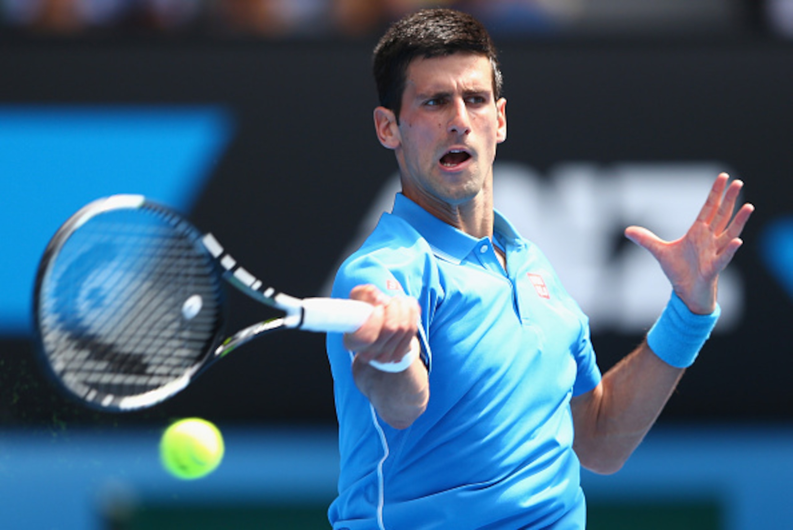 MELBOURNE, AUSTRALIA - JANUARY 20:  Novak Djokovic of Serbia plays a forehand in his first round match against Aljaz Bedene of Slovenia during day two of the 2015 Australian Open at Melbourne Park on January 20, 2015 in Melbourne, Australia.  (Photo by Ca