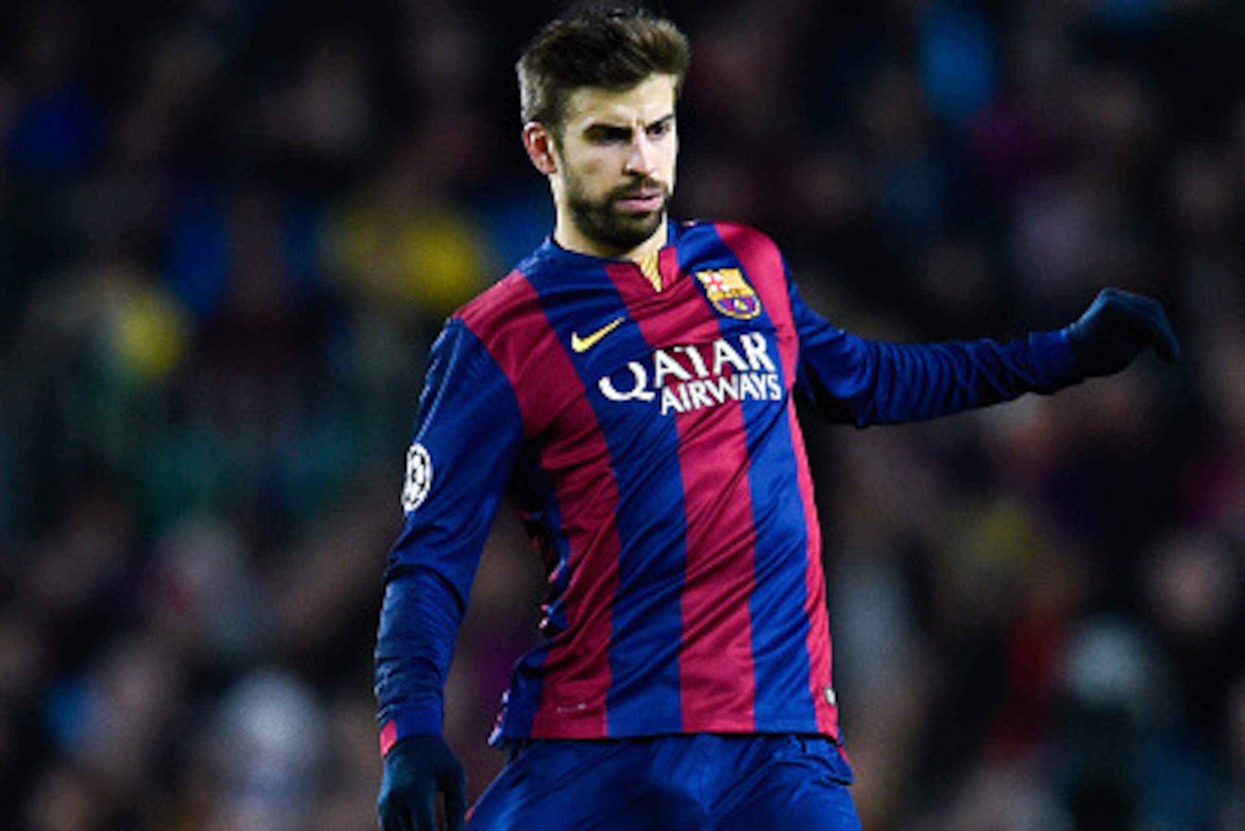 BARCELONA, SPAIN - DECEMBER 10:  Gerard Pique of FC Barcelona runs with the ball during the UEFA Champions League group F match between FC Barcelona and Paris Saint-Germanin FC at Camp Nou Stadium on December 10, 2014 in Barcelona, Spain.  (Photo by David