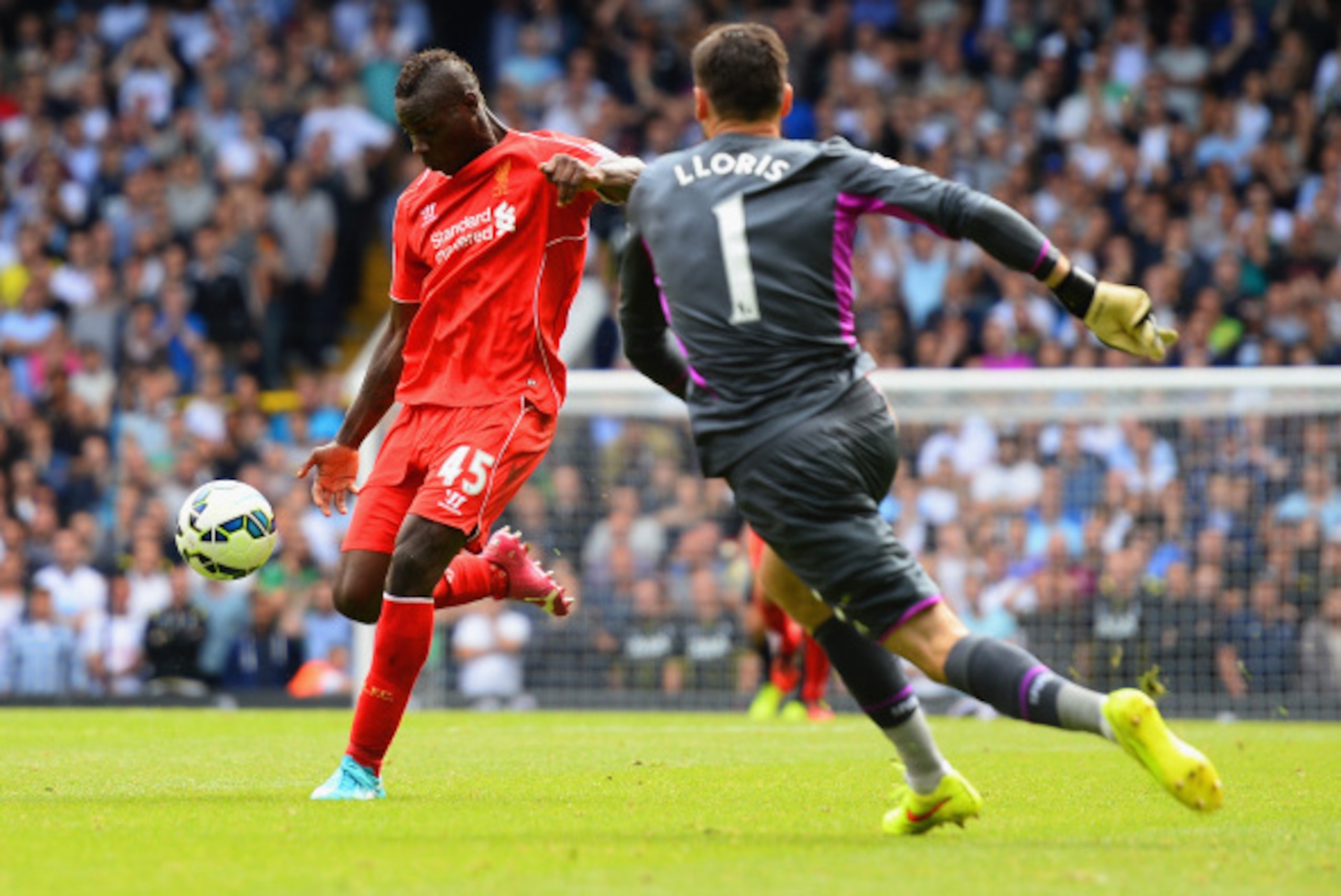 LONDON, ENGLAND - AUGUST 31:  Mario Balotelli of Liverpool shoots at an open goal past Hugo Lloris of Spurs during the Barclays Premier League match between Tottenham Hotspur and Liverpool at White Hart Lane on August 31, 2014 in London, England.  (Photo 