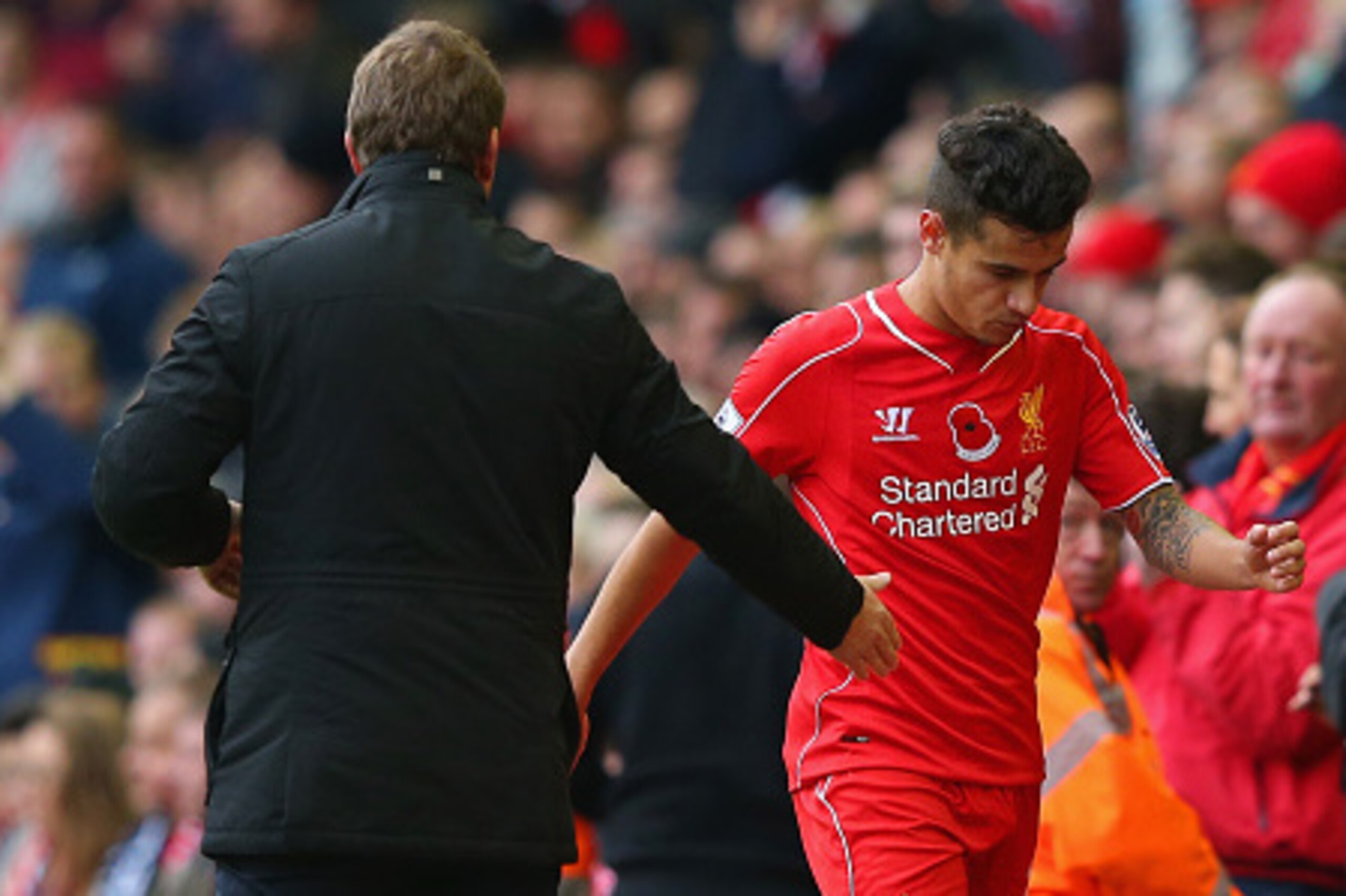 LIVERPOOL, ENGLAND - NOVEMBER 08:  Philippe Coutinho of Liverpool is substituted by Brendan Rodgers, manager of Liverpool during the Barclays Premier League match between Liverpool and Chelsea at Anfield on November 8, 2014 in Liverpool, England.  (Photo