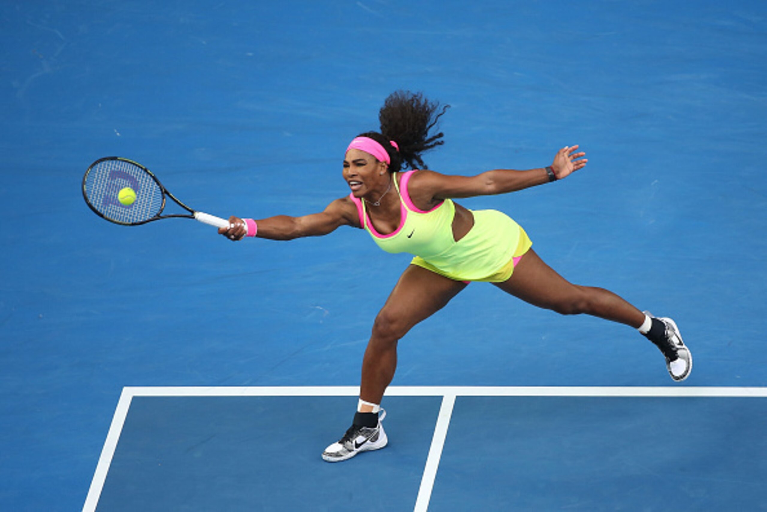MELBOURNE, AUSTRALIA - JANUARY 20:  Serena Williams of the United States plays a forehand in her first round match against Alison Van Uytvanck of Belgium during day two of the 2015 Australian Open at Melbourne Park on January 20, 2015 in Melbourne, Austra
