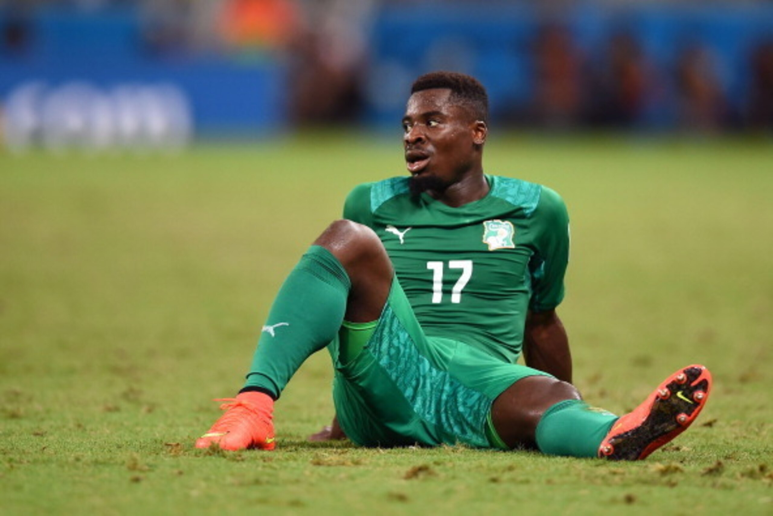 FORTALEZA, BRAZIL - JUNE 24:  A dejected Serge Aurier of the Ivory Coast looks on during the 2014 FIFA World Cup Brazil Group C match between Greece and the Ivory Coast at Castelao on June 24, 2014 in Fortaleza, Brazil.  (Photo by Laurence Griffiths/Getty