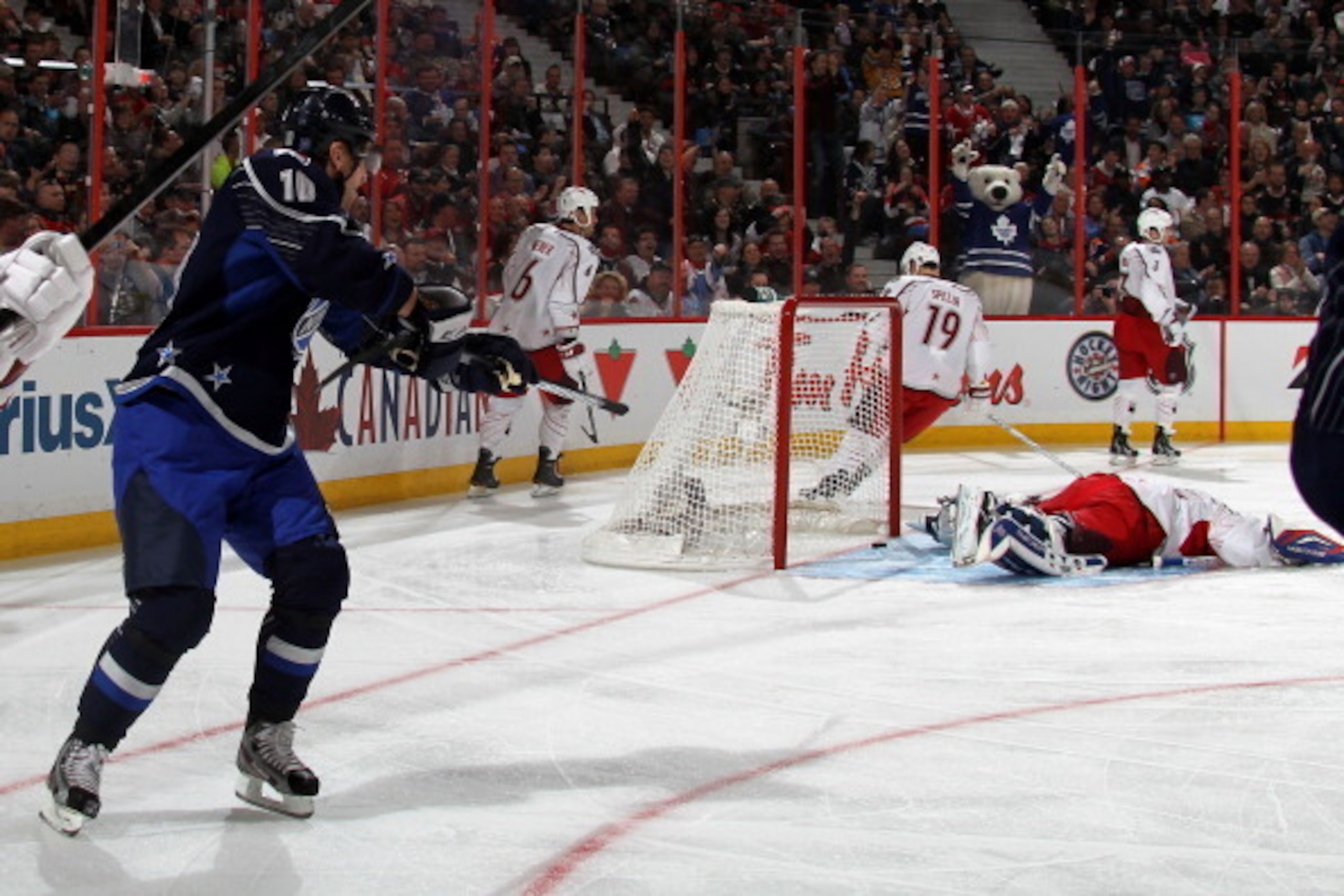 OTTAWA, ON - JANUARY 29:  Marian Gaborik #10 of the New York Rangers and Team Chara pretends to shoot Henrik Lundqvist #30 of the New York Rangers and Team Alfredsson with his hockey stick after a goal during the 2012 Tim Hortons NHL All-Star Game at Scot