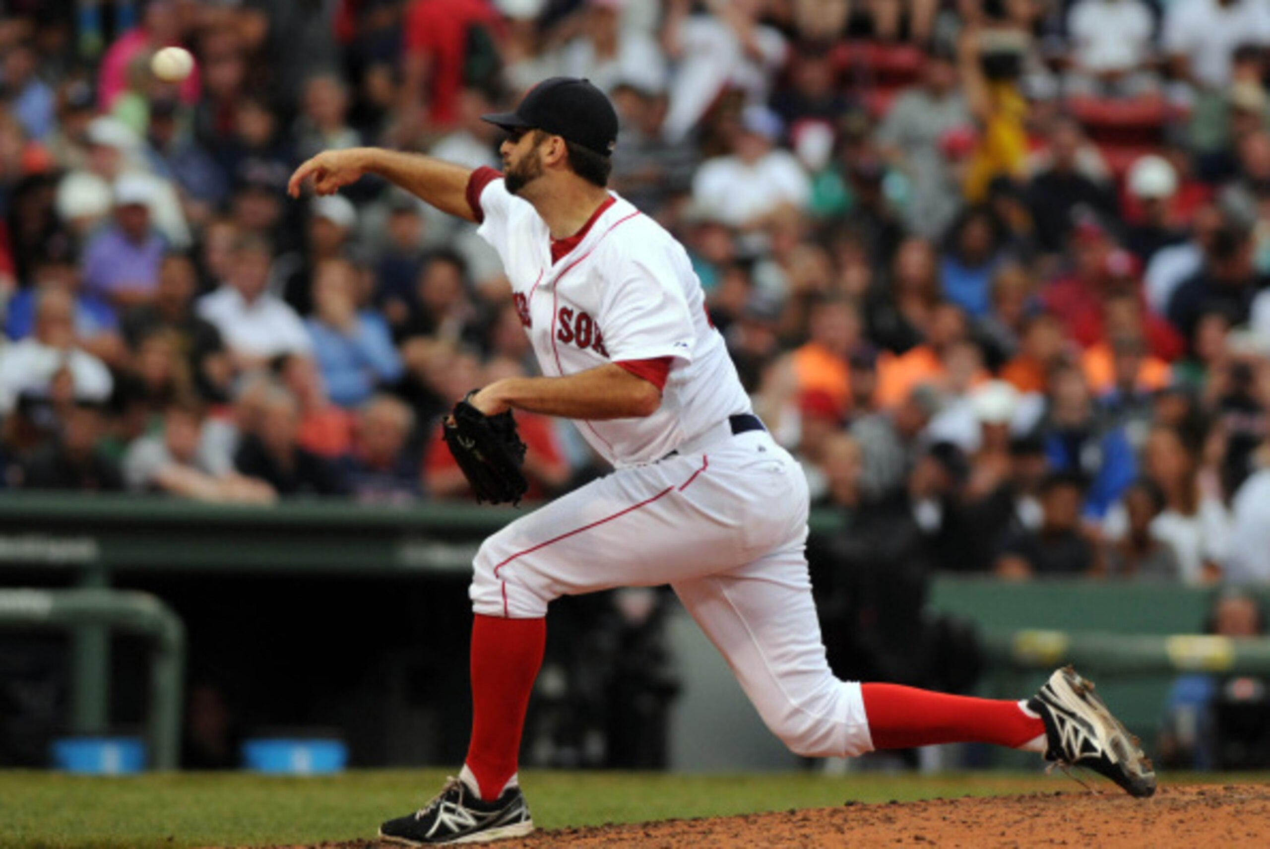 BOSTON, MA - AUGUST 02: Burke Badenhop #35 of the Boston Red Sox throws a pitch in the fourth inning against the New York Yankees at Fenway Park on August 2, 2014 in Boston, Massachusetts. The Yankees won the game 6-4. (Photo by Darren McCollester/Getty I
