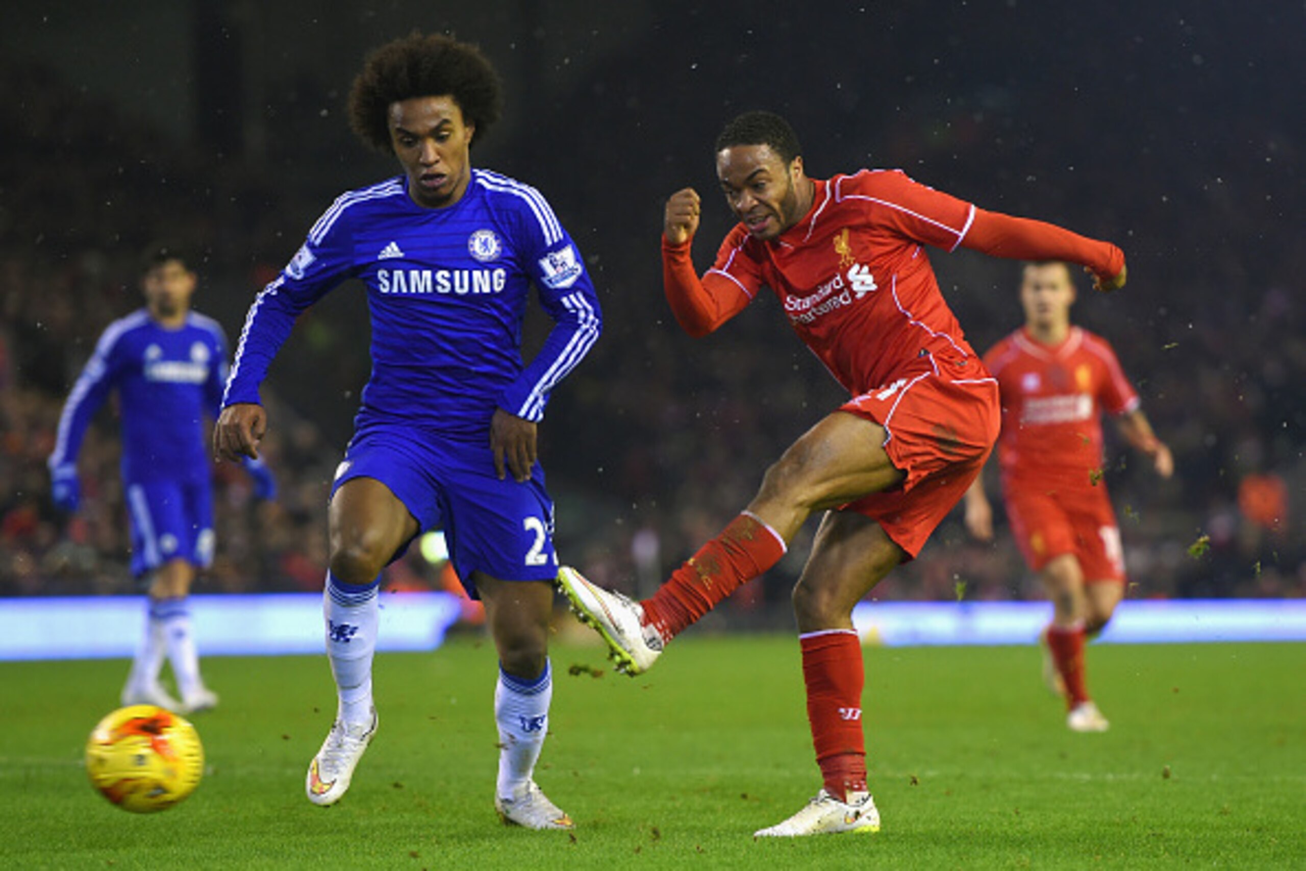 LIVERPOOL, ENGLAND - JANUARY 20: Willian of Chelsea closes down Raheem Sterling of Liverpool during the Capital One Cup Semi-Final first leg match between Liverpool and Chelsea at Anfield on January 20, 2015 in Liverpool, England. (Photo by Michael Rega LIVERPOOL, ENGLAND - JANUARY 20: Willian of Chelsea closes down Raheem Sterling of Liverpool during the Capital One Cup Semi-Final first leg match between Liverpool and Chelsea at Anfield on January 20, 2015 in Liverpool, England. (Photo by Michael Rega
