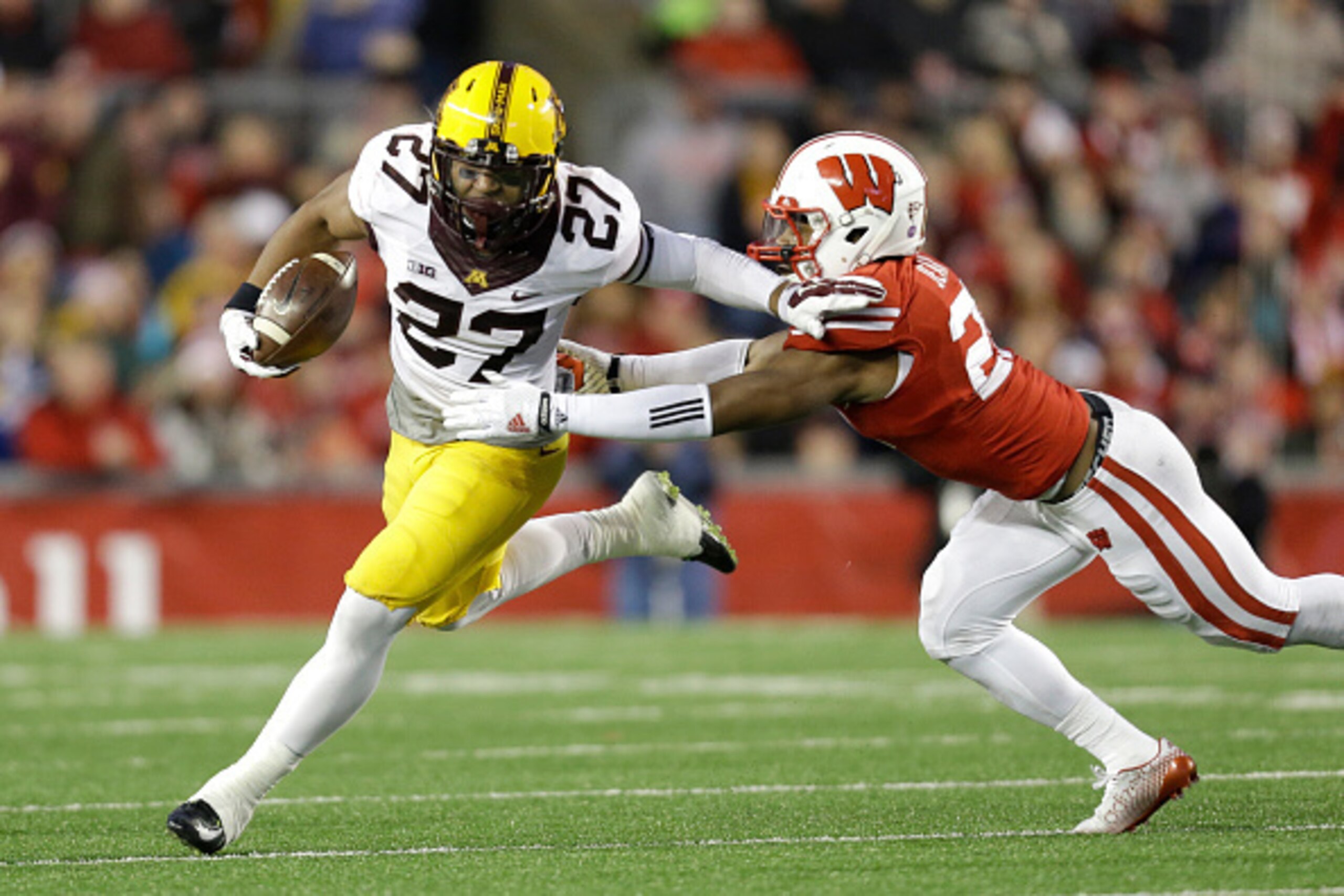 MADISON, WI - NOVEMBER 29: David Cobb #27 of the Minnesota Golden Gophers runs with the football during the second half against the Wisconsin Badgers at Camp Randall Stadium on November 29, 2014 in Madison, Wisconsin. (Photo by Mike McGinnis/Getty Images)
