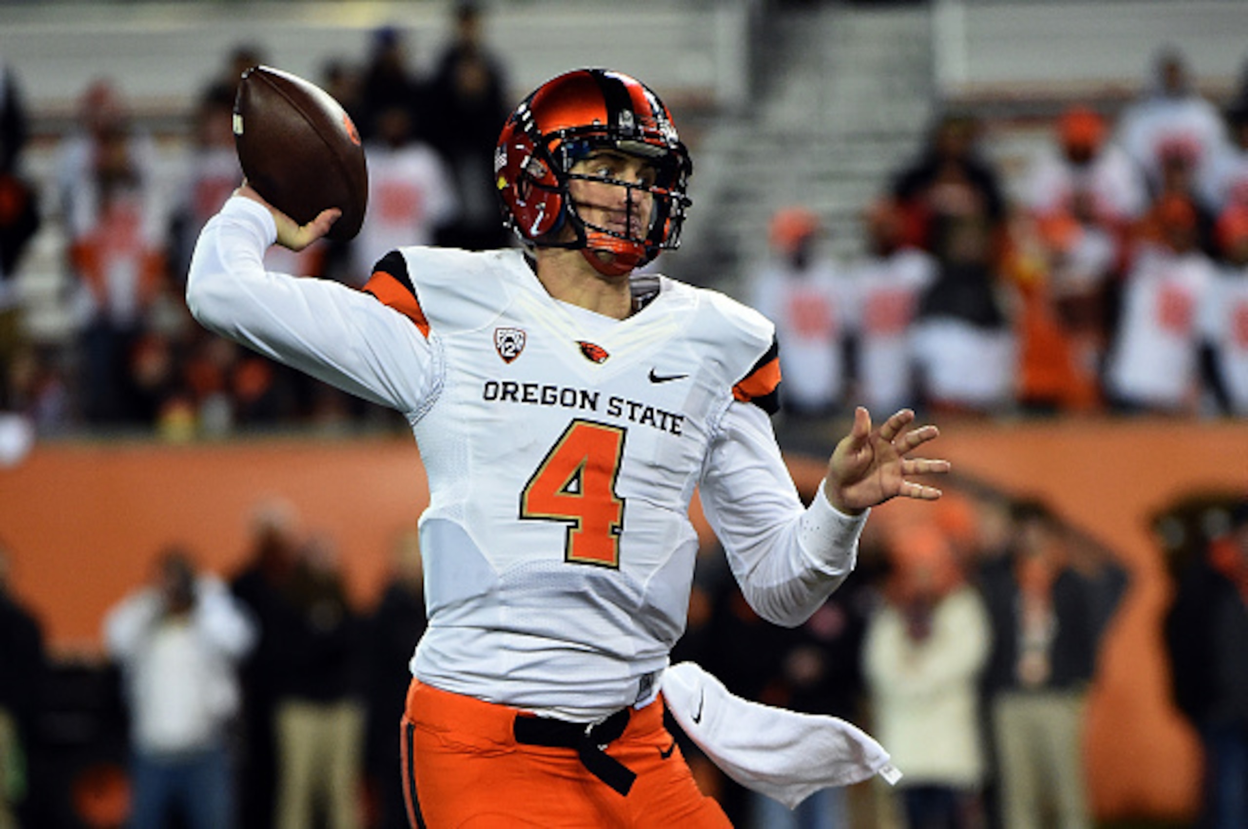CORVALLIS, OR - NOVEMBER 29: Quarterback Sean Mannion #4 of the Oregon State Beavers passes the ball during the fourth quarter of the game against the Oregon Ducks at Reser Stadium on November 29, 2014 in Corvallis, Oregon. (Photo by Steve Dykes/Getty Ima