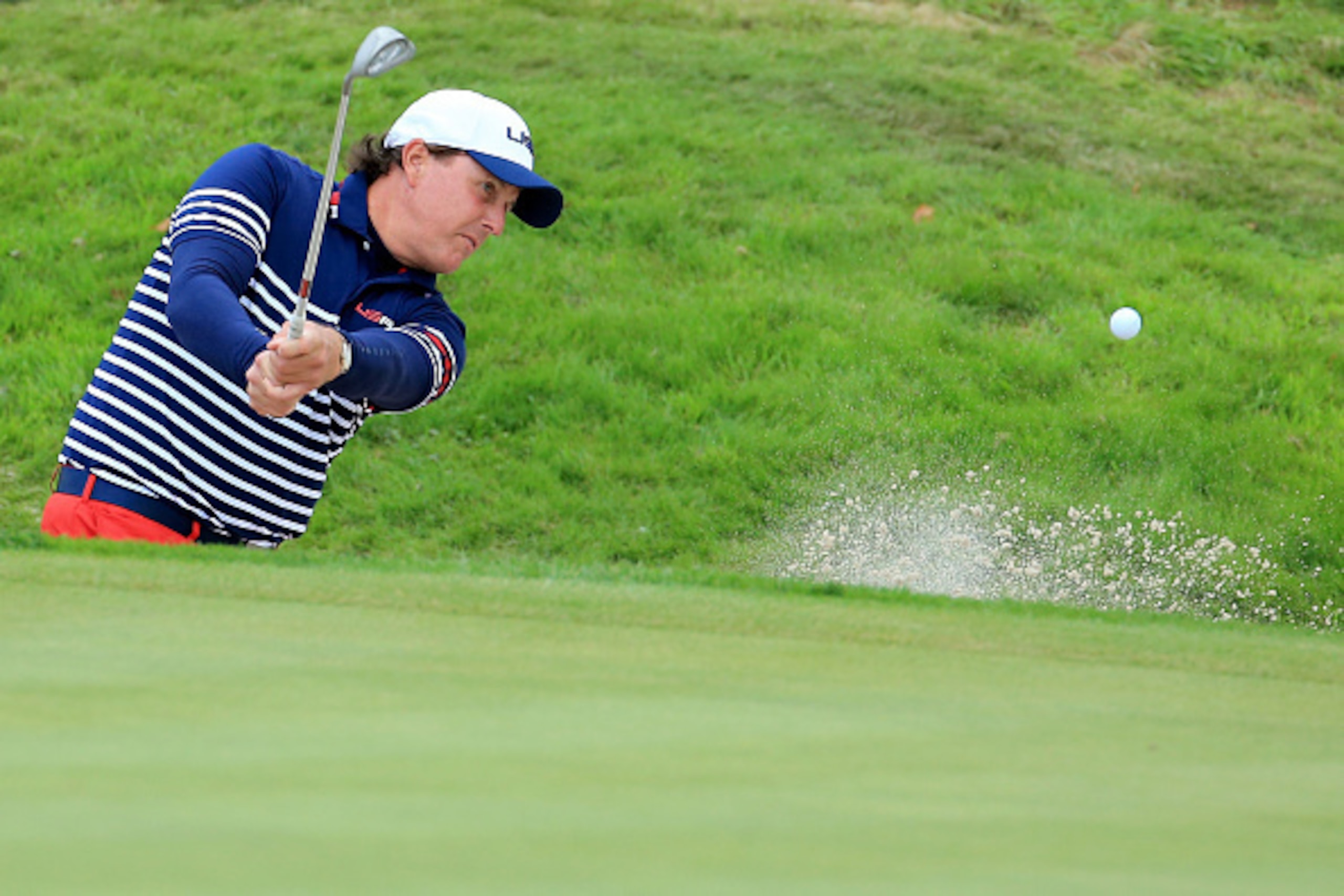 AUCHTERARDER, SCOTLAND - SEPTEMBER 28: Phil Mickelson of the United States plays out of a bunker on the 17th hole during the Singles Matches of the 2014 Ryder Cup on the PGA Centenary course at the Gleneagles Hotel on September 28, 2014 in Auchterarder, S