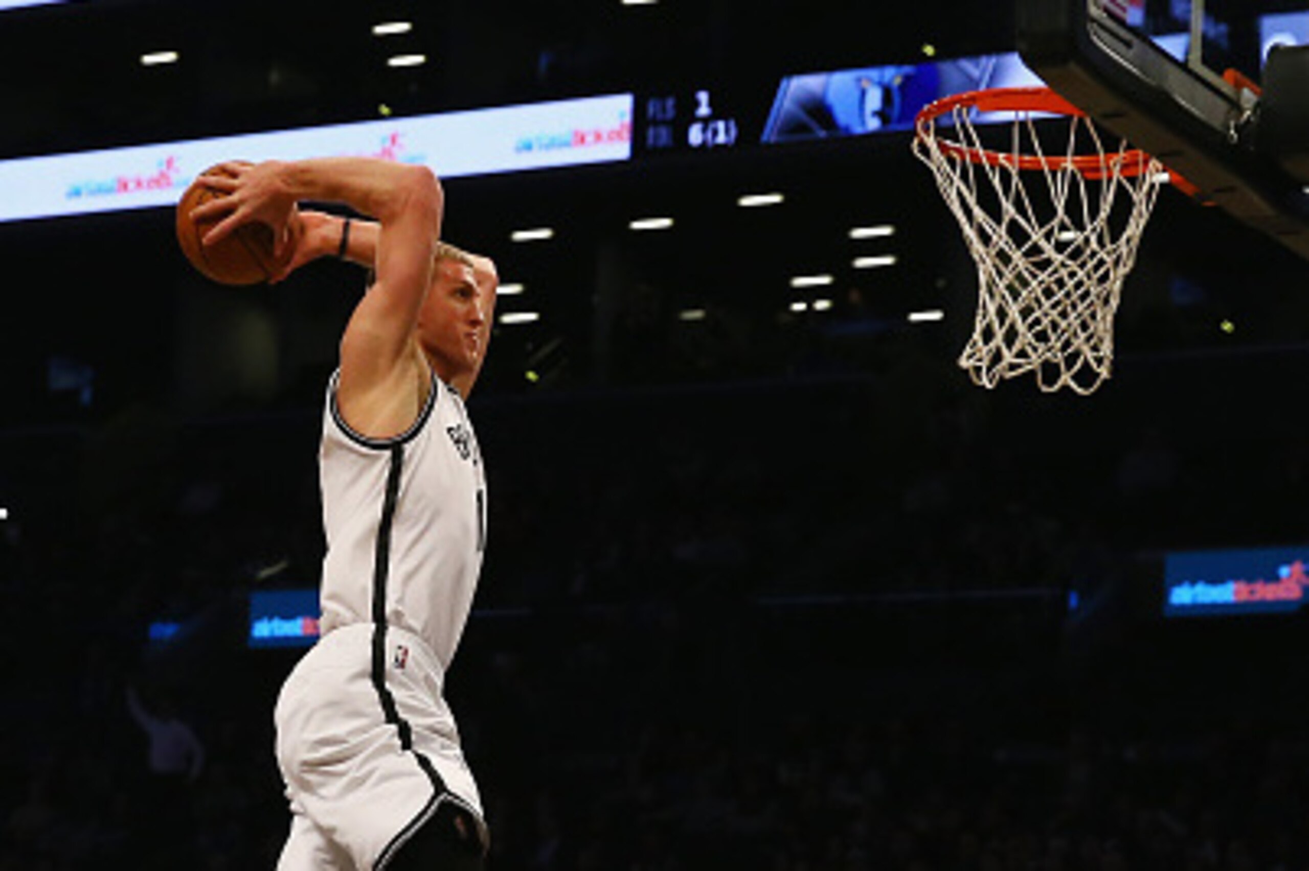 NEW YORK, NY - JANUARY 14:  Mason Plumlee #1 of the Brooklyn Nets scores against the Memphis Grizzlies during their game at the Barclays Center on January 14, 2015 in New York City. NOTE TO USER: User expressly acknowledges and agrees that, by downloading