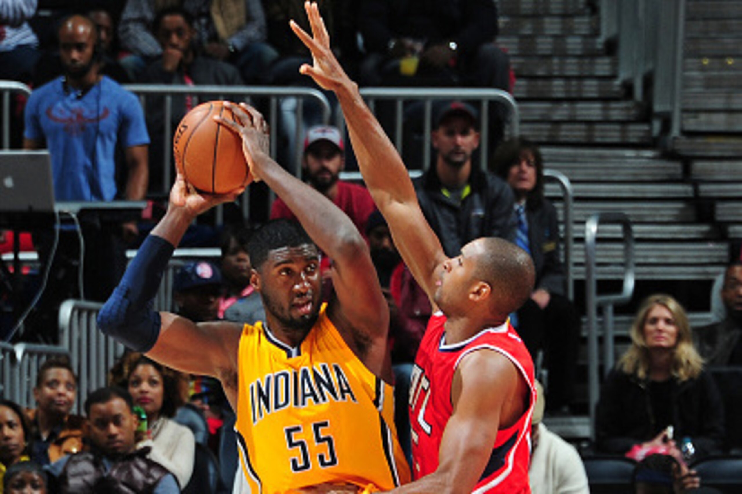 ATLANTA, GA - NOVEMBER 1: Roy Hibbert #55 of the Indiana Pacers is defended by Al Horford #15 of the Atlanta Hawks on November 1, 2014 at Philips Arena in Atlanta, Georgia.  NOTE TO USER: User expressly acknowledges and agrees that, by downloading and/or 