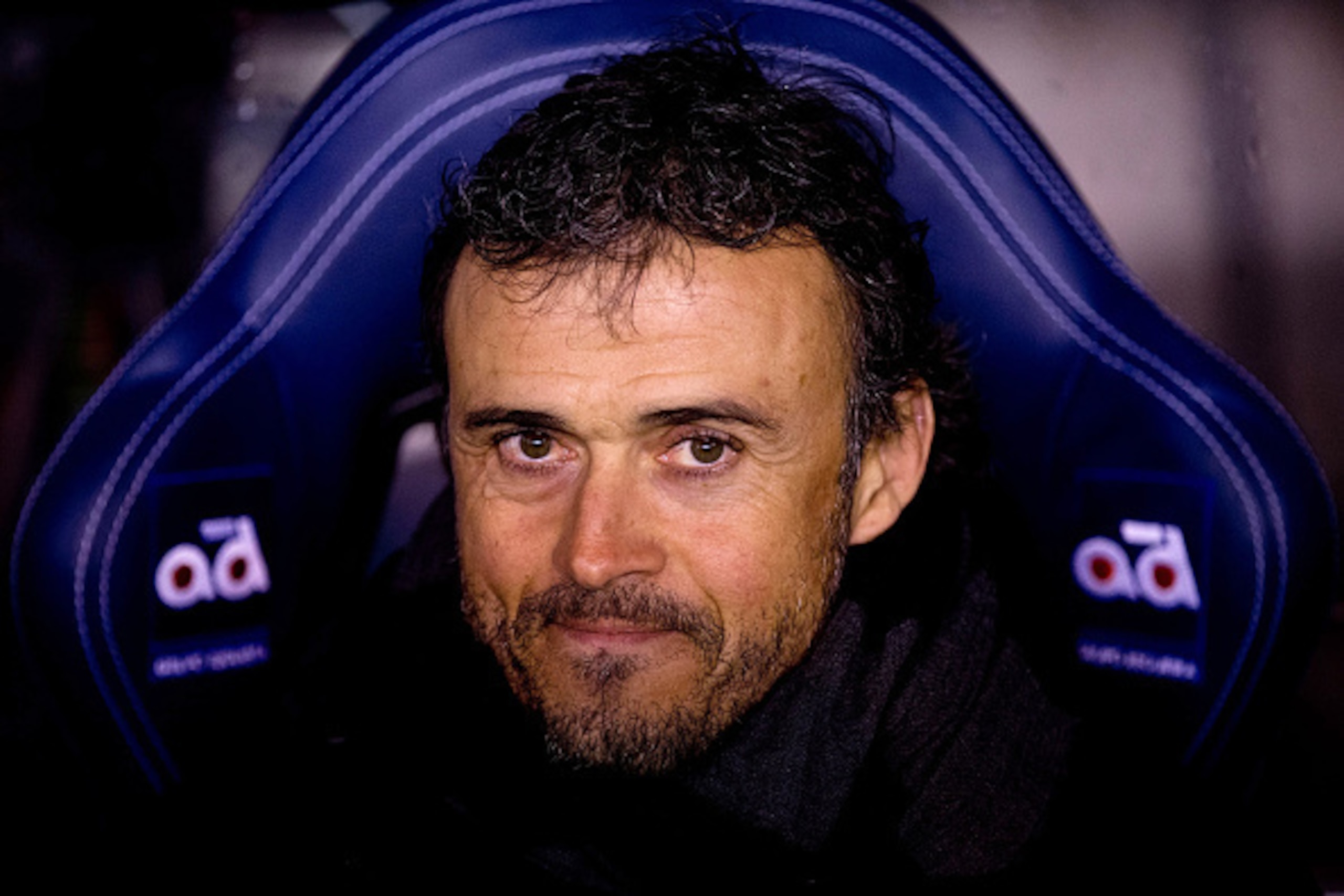 LA CORUNA, SPAIN - JANUARY 18: Head coach Luis Enrique Martinez of FC Barcelona smiles on the bench prior to start the La Liga match between RC Deportivo La Coruna and FC Barcelona at Riazor Stadium on January 18, 2015 in La Coruna, Spain.  (Photo by Gonz