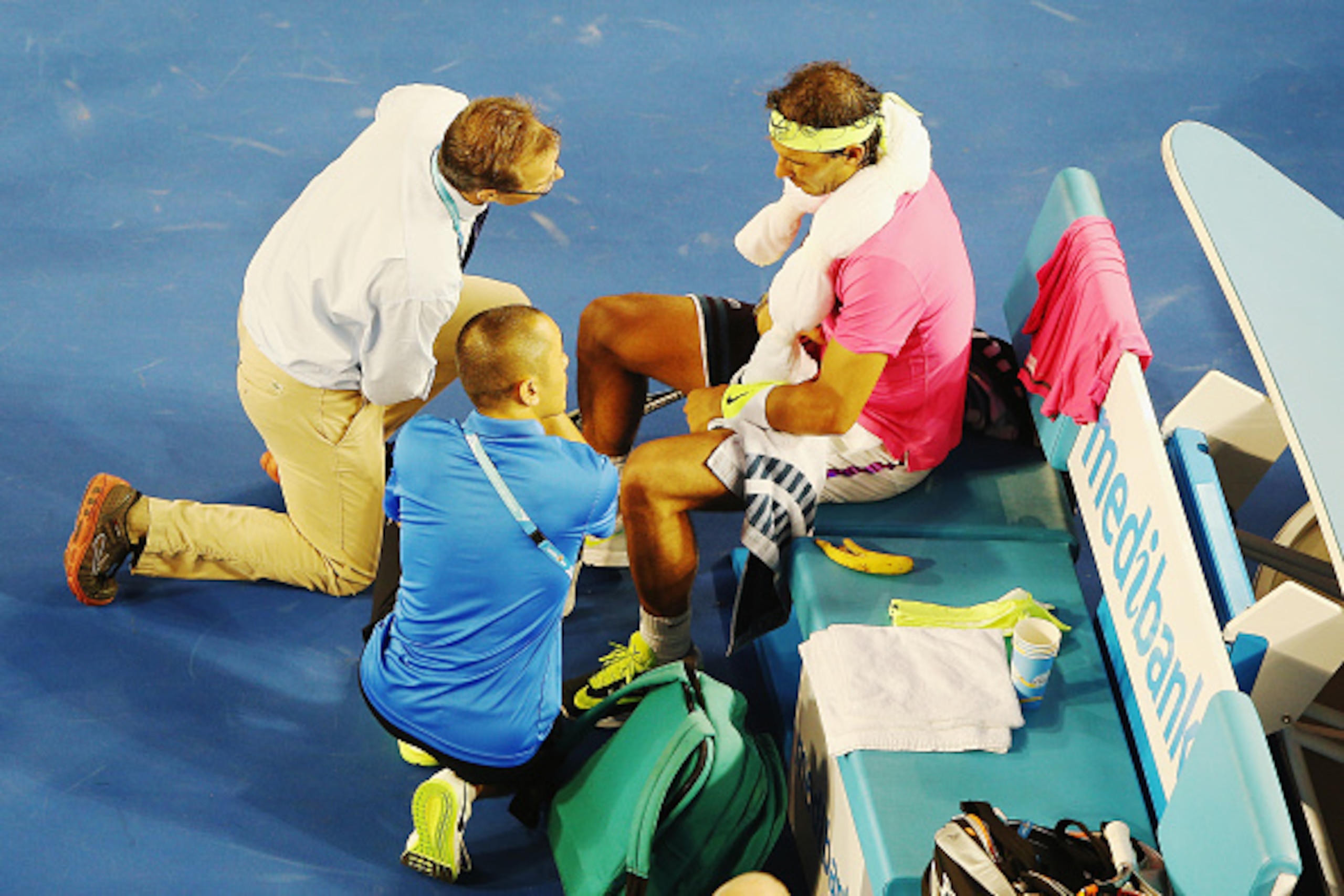 MELBOURNE, AUSTRALIA - JANUARY 21:  Rafael Nadal of Spain talks to his doctors in his second round match against Tim Smyczek of USA during day three of the 2015 Australian Open at Melbourne Park on January 21, 2015 in Melbourne, Australia.  (Photo by Hann