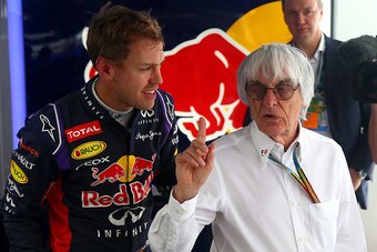 SOCHI, RUSSIA - OCTOBER 10:  Sebastian Vettel of Germany and Infiniti Red Bull Racing speaks with F1 supremo Bernie Ecclestone during practice ahead of the Russian Formula One Grand Prix at Sochi Autodrom on October 10, 2014 in Sochi, Russia.  (Photo by M