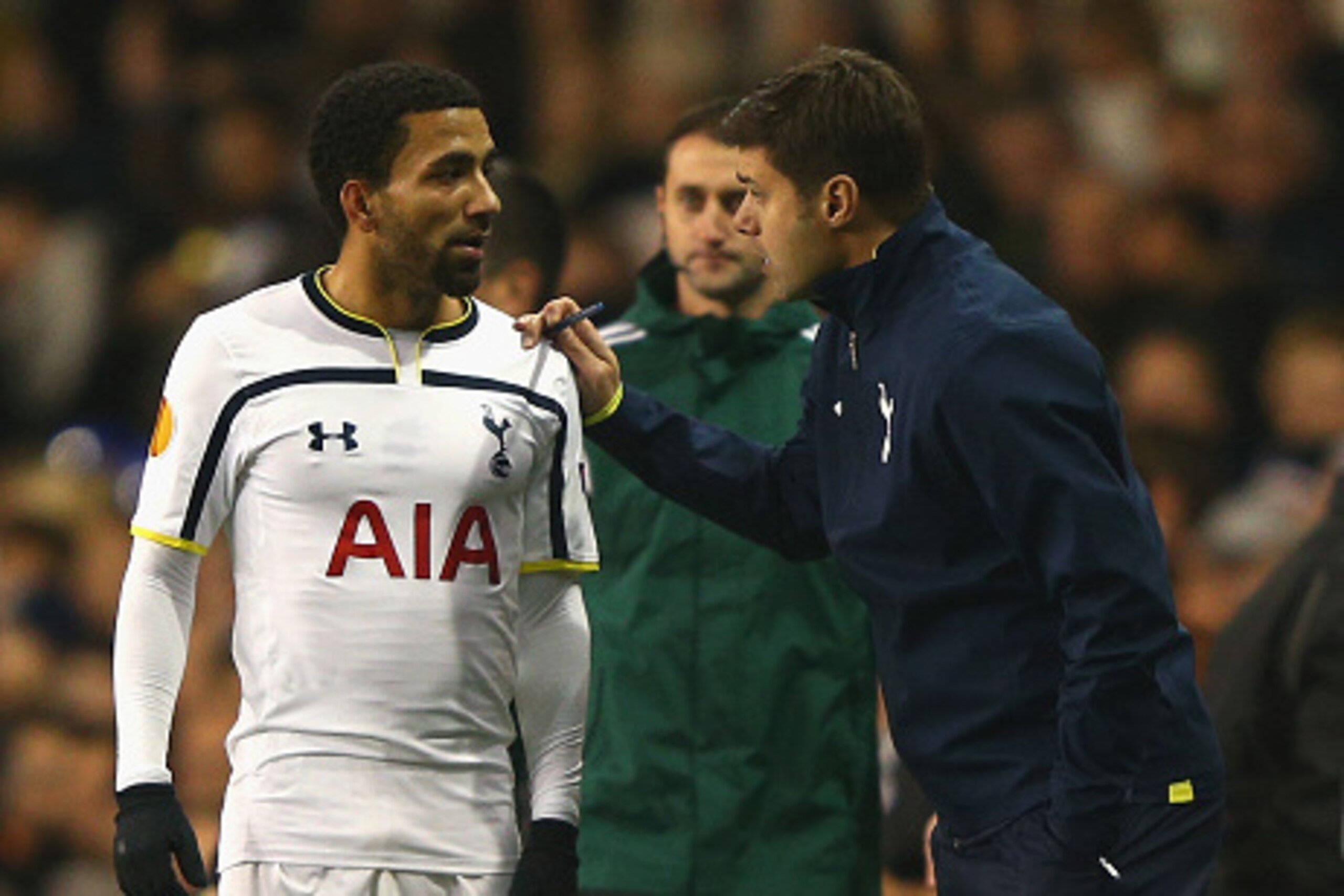 LONDON, ENGLAND - NOVEMBER 27:  Aaron Lennon of Spurs speaks to Manager Mauricio Pochettino of Spurs uring the UEFA Europa League group C match between Tottenham Hotspur FC and FK Partizan at White Hart Lane on November 27, 2014 in London, United Kingdom.