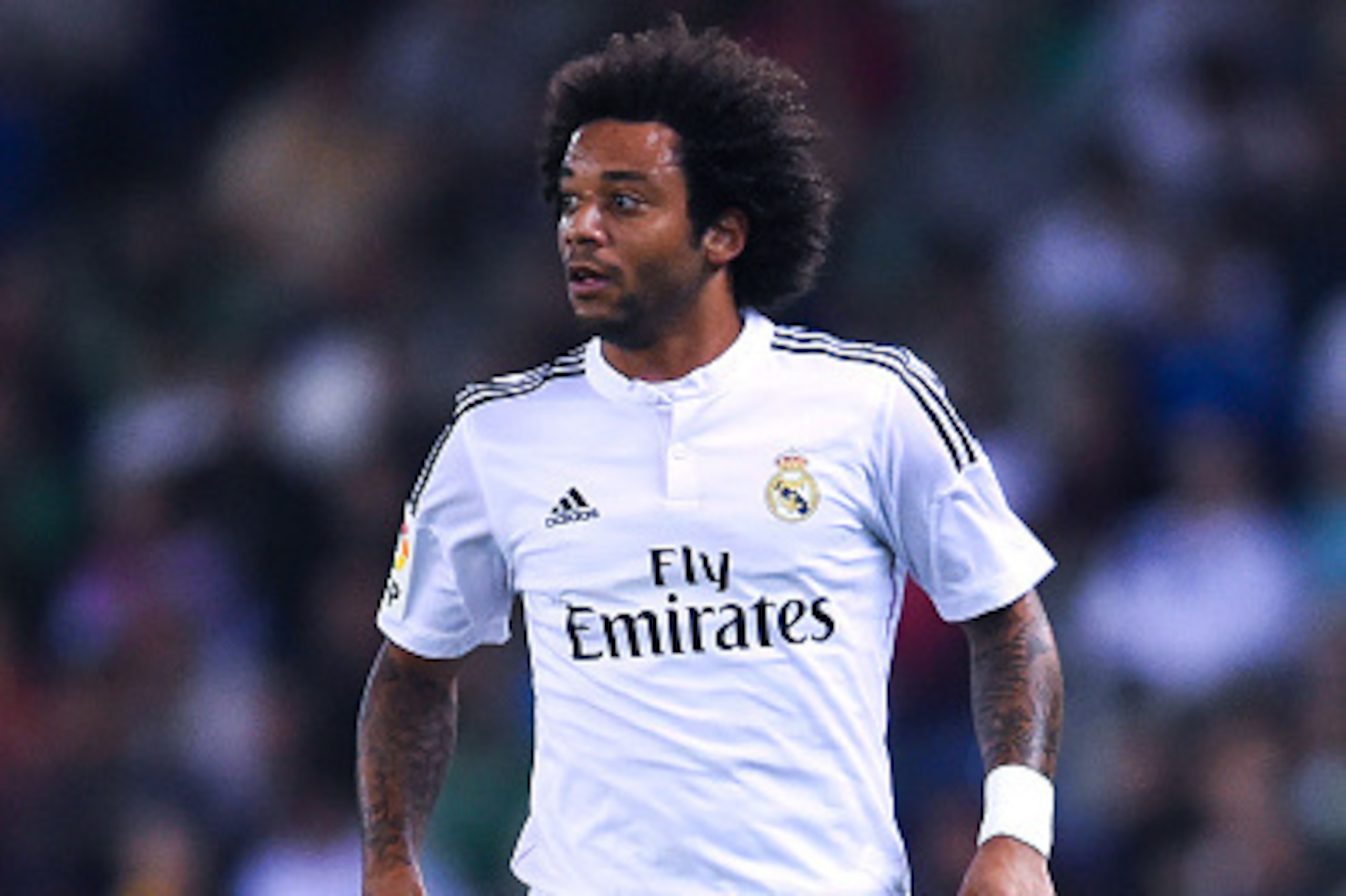 BARCELONA, SPAIN - OCTOBER 29:  Marcelo Vieira of Real Madrid CF runs with the ball during the Copa Del Rey Round of 32 first leg match at Power8 Stadium on October 29, 2014 in Barcelona, Spain.  (Photo by David Ramos/Getty Images)