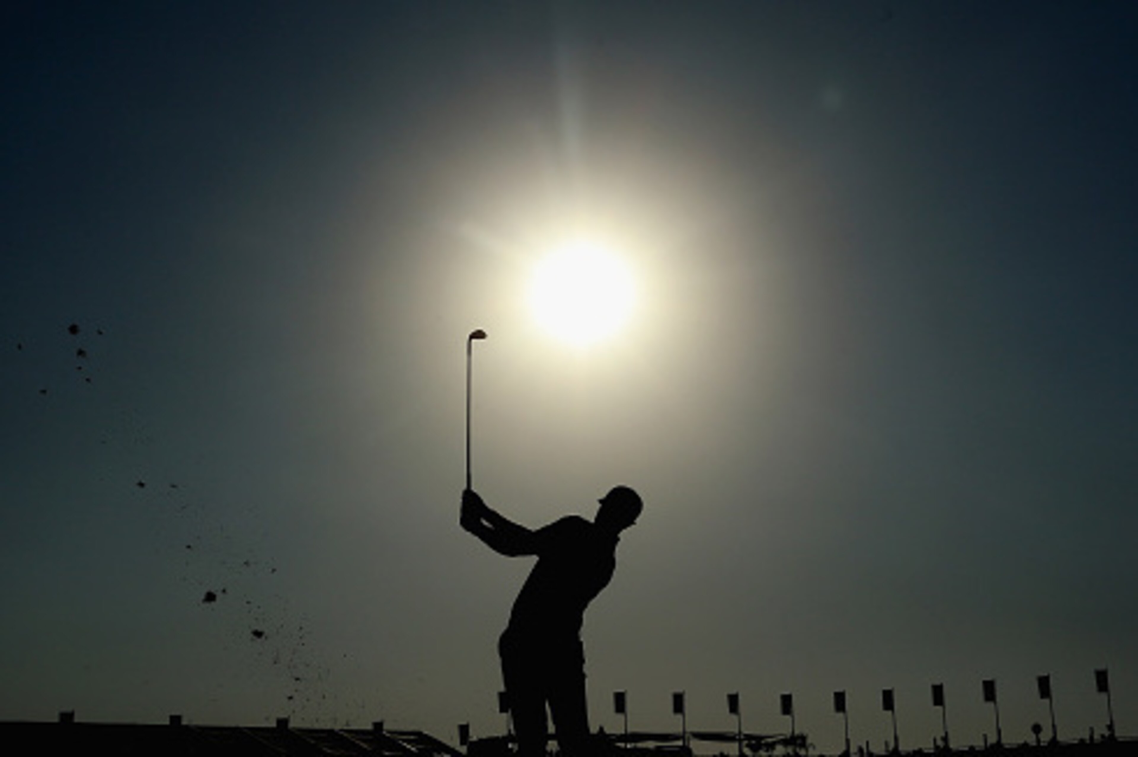 DOHA, QATAR - JANUARY 21:  Oliver Fisher of England plays his third shot on the ninth hole during the first round of the Commercial Bank Qatar Masters at Doha Golf Club on January 21, 2015 in Doha, Qatar.  (Photo by Andrew Redington/Getty Images)
