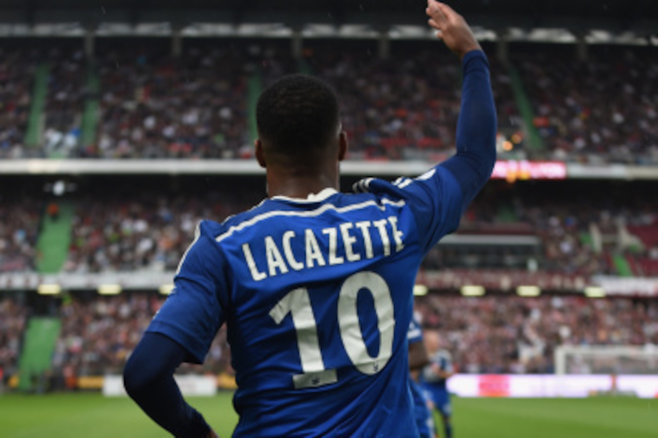 METZ, FRANCE - AUGUST 31: Alexandre Lacazette of Lyon celebrates scoring his team's first goal during the French Ligue 1 match between FC Metz and Olympique Lyonnais at Stade Saint-Symphorien on August 31, 2014 in Metz, France. (Photo by Kaz Photography METZ, FRANCE - AUGUST 31: Alexandre Lacazette of Lyon celebrates scoring his team's first goal during the French Ligue 1 match between FC Metz and Olympique Lyonnais at Stade Saint-Symphorien on August 31, 2014 in Metz, France. (Photo by Kaz Photography