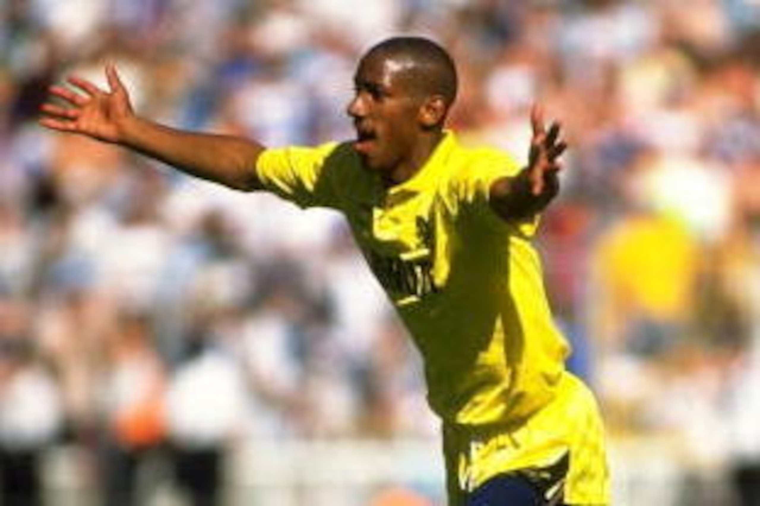 1990:  Dion Dublin of Cambridge United celebrates after scoring during the Barclays League Fourth Division play-off against Chesterfield at the Abbey Stadium in Cambridge, England.  \ Mandatory Credit: Dan  Smith/Allsport