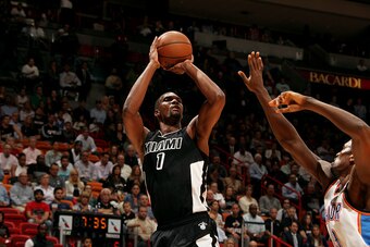MIAMI, FL - JANUARY 20: Chris Bosh #1 of the Miami Heat shoots against the Oklahoma City Thunder on January 20, 2015 at American Airlines Arena in Miami, Florida. NOTE TO USER: User expressly acknowledges and agrees that, by downloading and or using this 