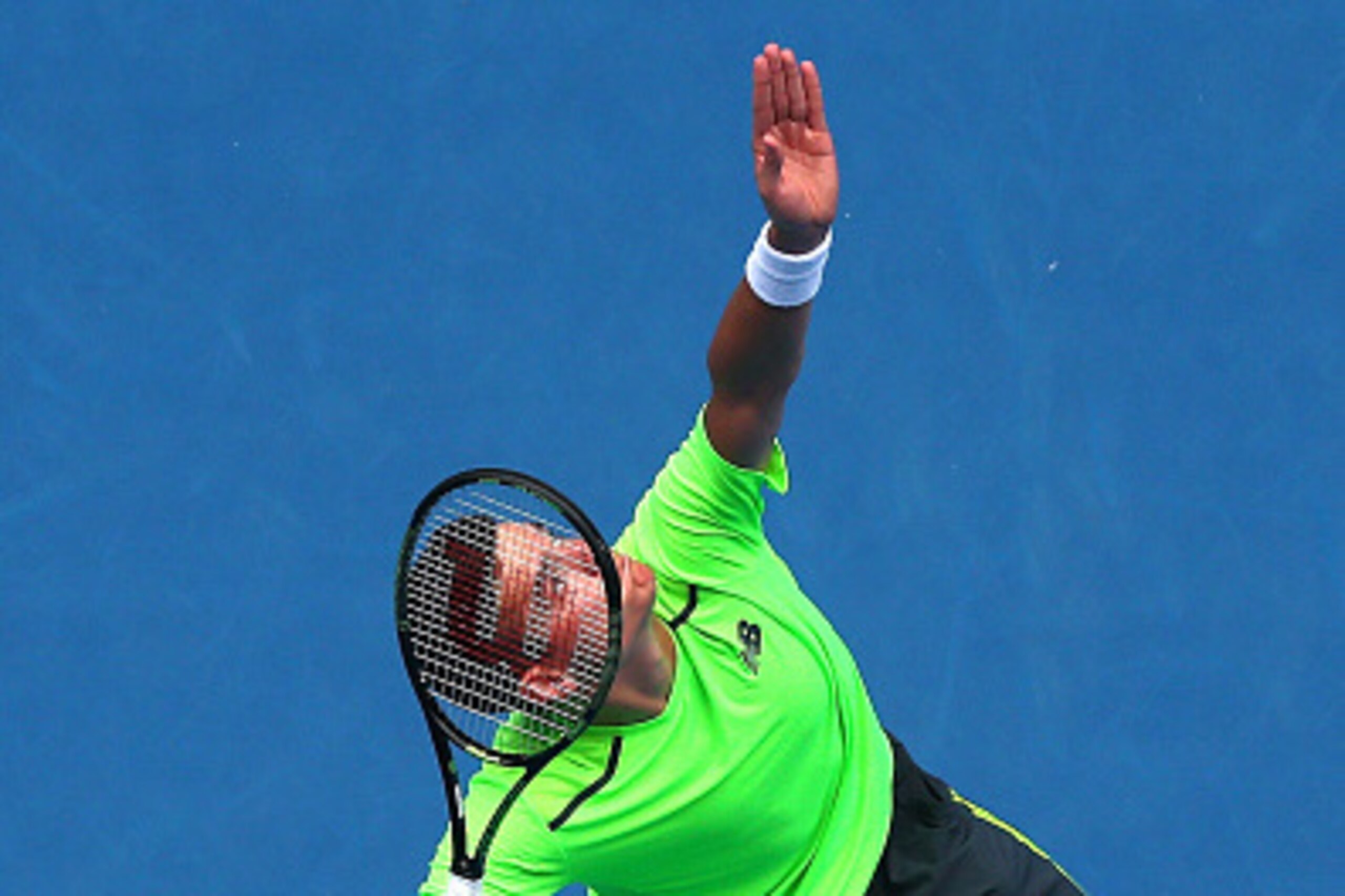 MELBOURNE, AUSTRALIA - JANUARY 20: Milos Raonic of Canada serves in his first round match against Illya Marchenko of the Ukraine during day two of the 2015 Australian Open at Melbourne Park on January 20, 2015 in Melbourne, Australia. (Photo by Robert P MELBOURNE, AUSTRALIA - JANUARY 20: Milos Raonic of Canada serves in his first round match against Illya Marchenko of the Ukraine during day two of the 2015 Australian Open at Melbourne Park on January 20, 2015 in Melbourne, Australia. (Photo by Robert P
