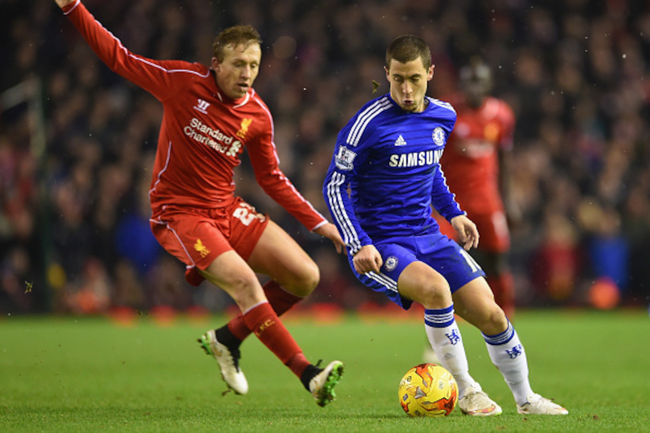 LIVERPOOL, ENGLAND - JANUARY 20: Eden Hazard of Chelsea is marshalled by Lucas Leiva of Liverpool during the Capital One Cup Semi-Final first leg match between Liverpool and Chelsea at Anfield on January 20, 2015 in Liverpool, England. (Photo by Michael LIVERPOOL, ENGLAND - JANUARY 20: Eden Hazard of Chelsea is marshalled by Lucas Leiva of Liverpool during the Capital One Cup Semi-Final first leg match between Liverpool and Chelsea at Anfield on January 20, 2015 in Liverpool, England. (Photo by Michael