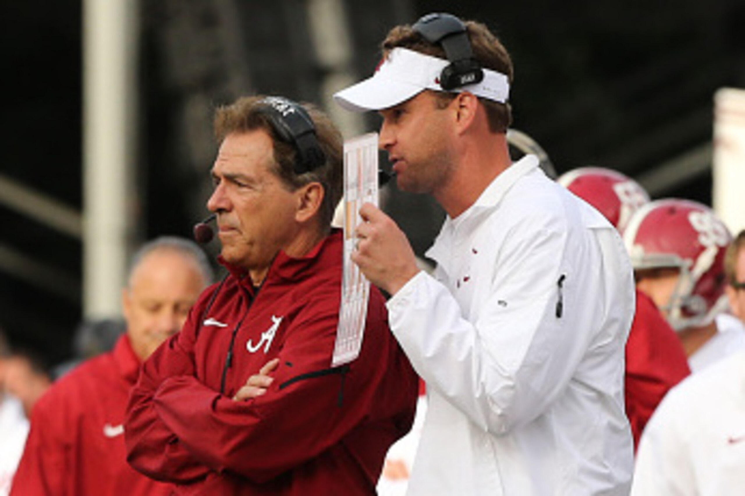 OXFORD, MS - OCTOBER 4: Nick Saban, Head coach of the Alabama Crimson Tide and Offensive Coordinator Lane Kiffin of the Alabama Crimson Tide talk on the sideline against the Ole Miss Rebels  on OCTOBER 4, 2014 at Vaught-Hemingway Stadium in Oxford, Missis