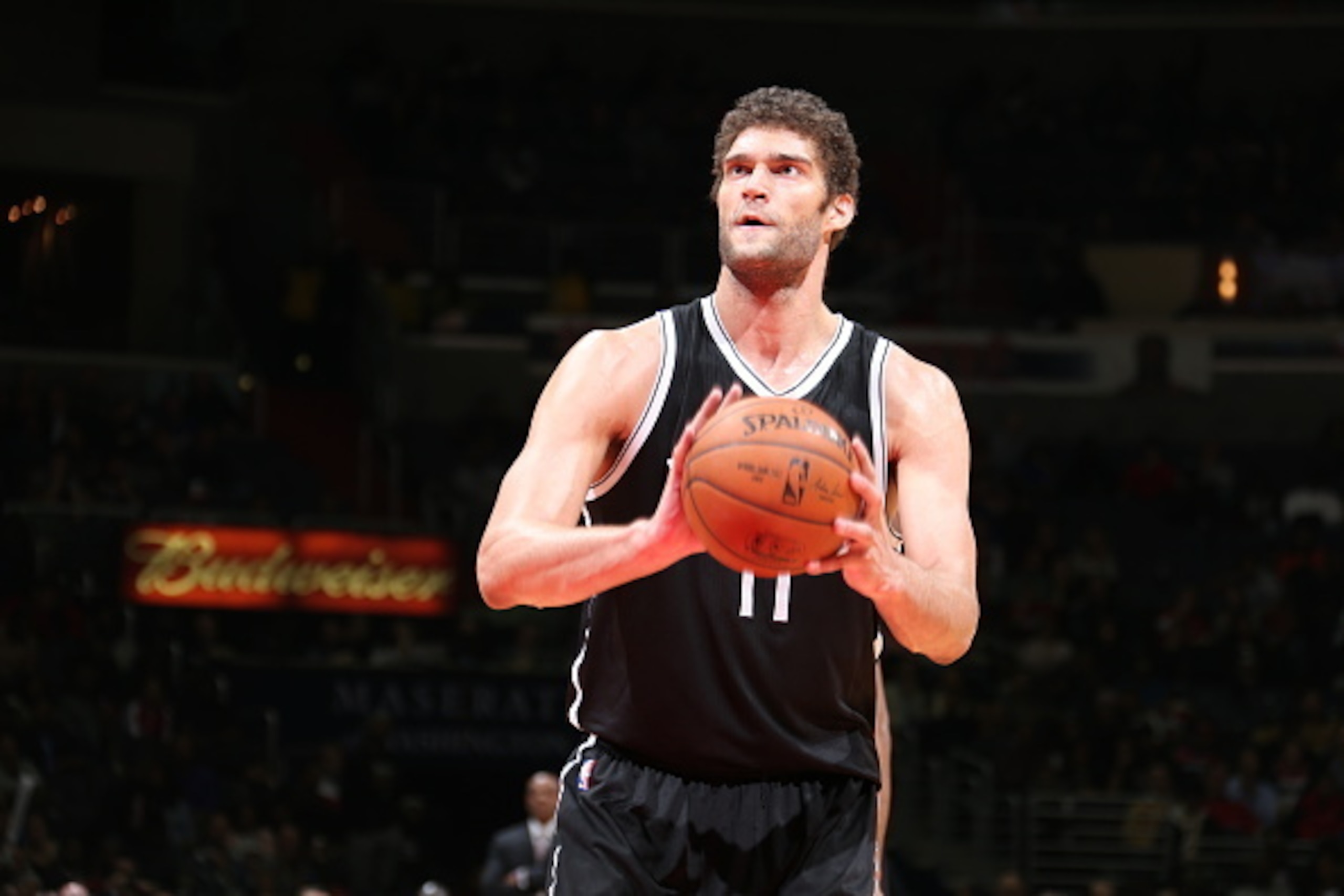 WASHINGTON, DC -  JANUARY 16: Brook Lopez #11 of the Brooklyn Nets attempts a free throw against the Washington Wizards on January 16, 2015 at Verizon Center in Washington, DC. NOTE TO USER: User expressly acknowledges and agrees that, by downloading and 