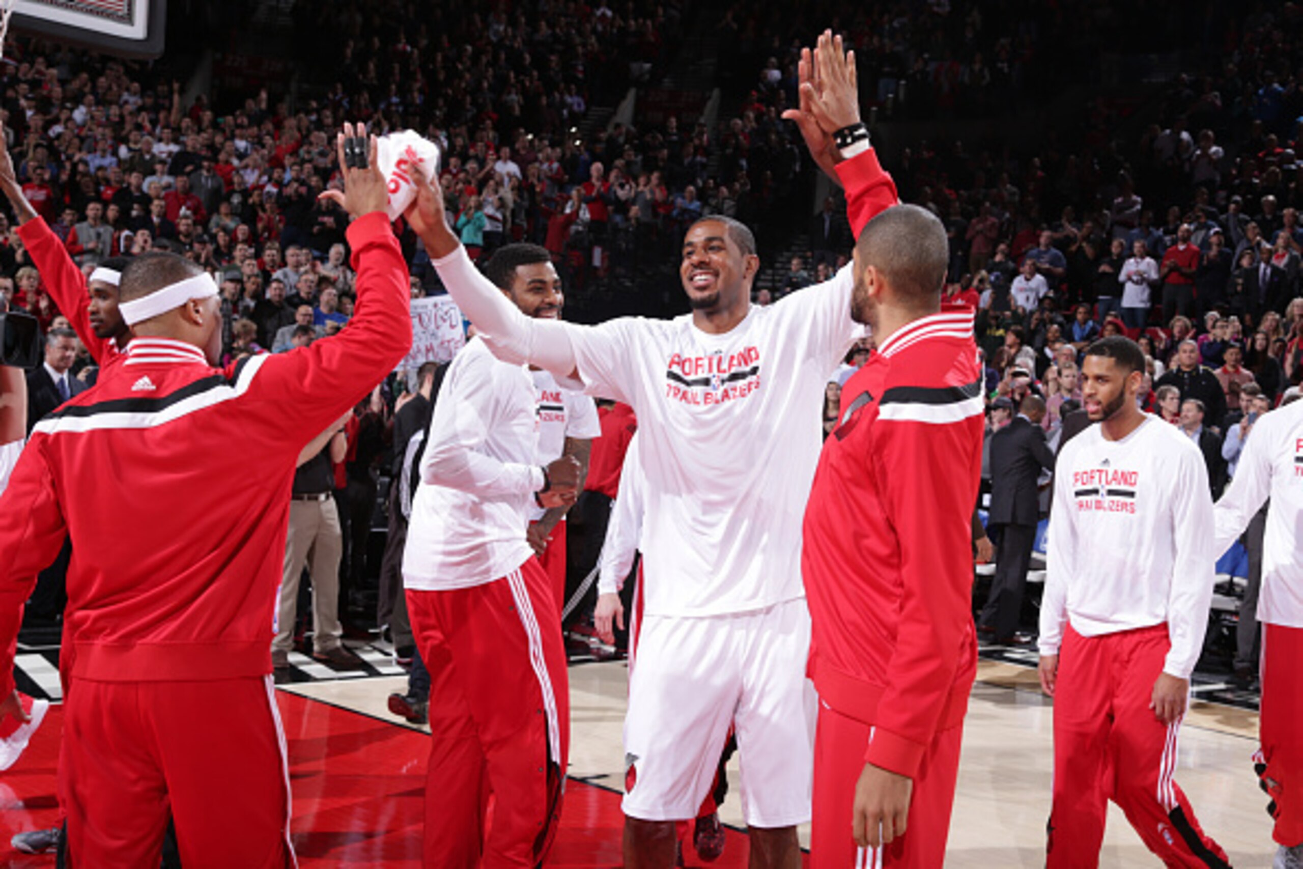 PORTLAND, OR - JANUARY 8:  LaMarcus Aldridge #12 of the Portland Trail Blazers runs out before the game against the Miami Heat on January 8, 2015 at the Moda Center Arena in Portland, Oregon. NOTE TO USER: User expressly acknowledges and agrees that, by d