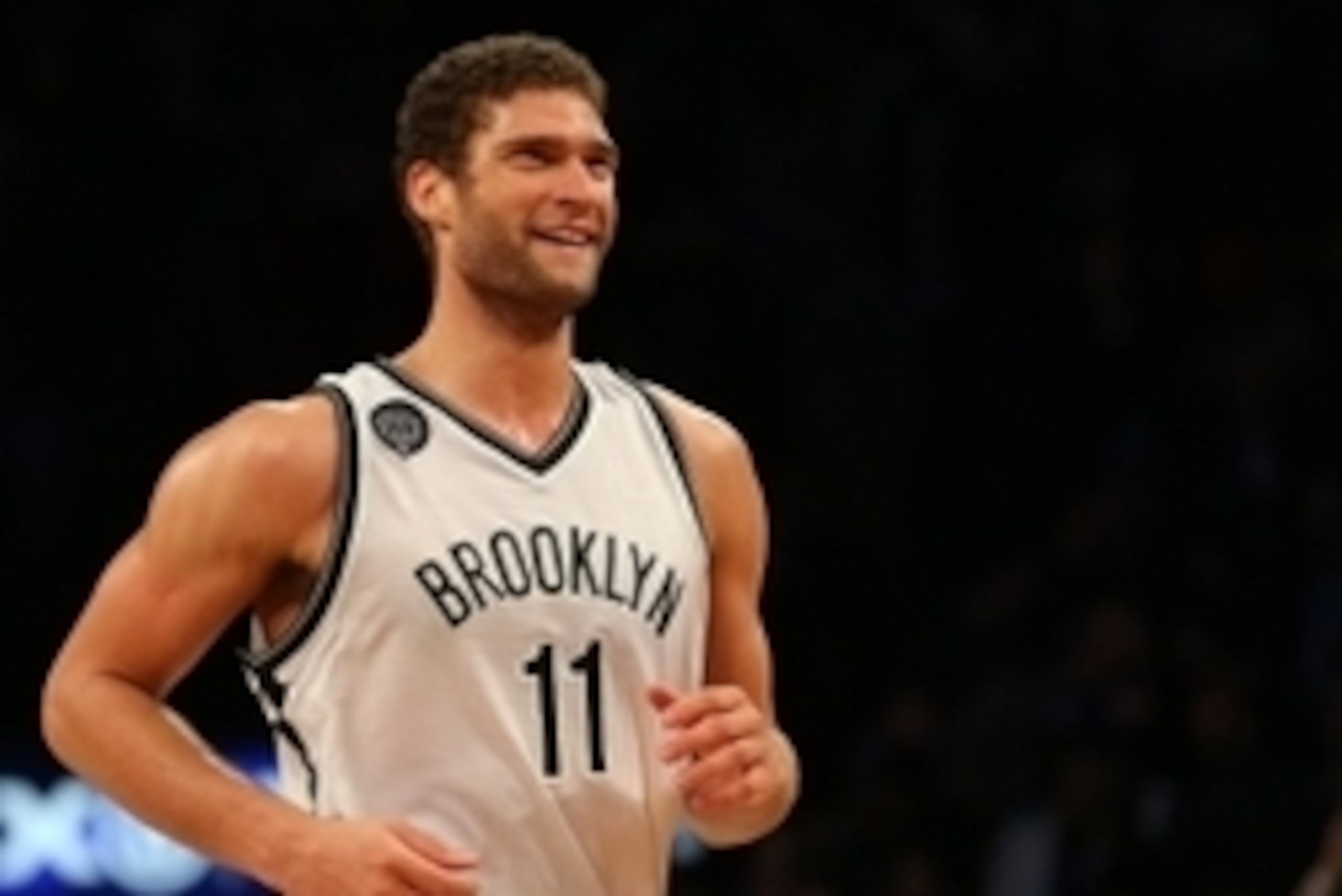 Dec 3, 2014; Brooklyn, NY, USA; Brooklyn Nets center Brook Lopez (11) reacts after making a shot late in the fourth quarter against the San Antonio Spurs at the Barclays Center. The Nets defeated the Spurs 95-93. Mandatory Credit: Adam Hunger-USA TODAY Sp