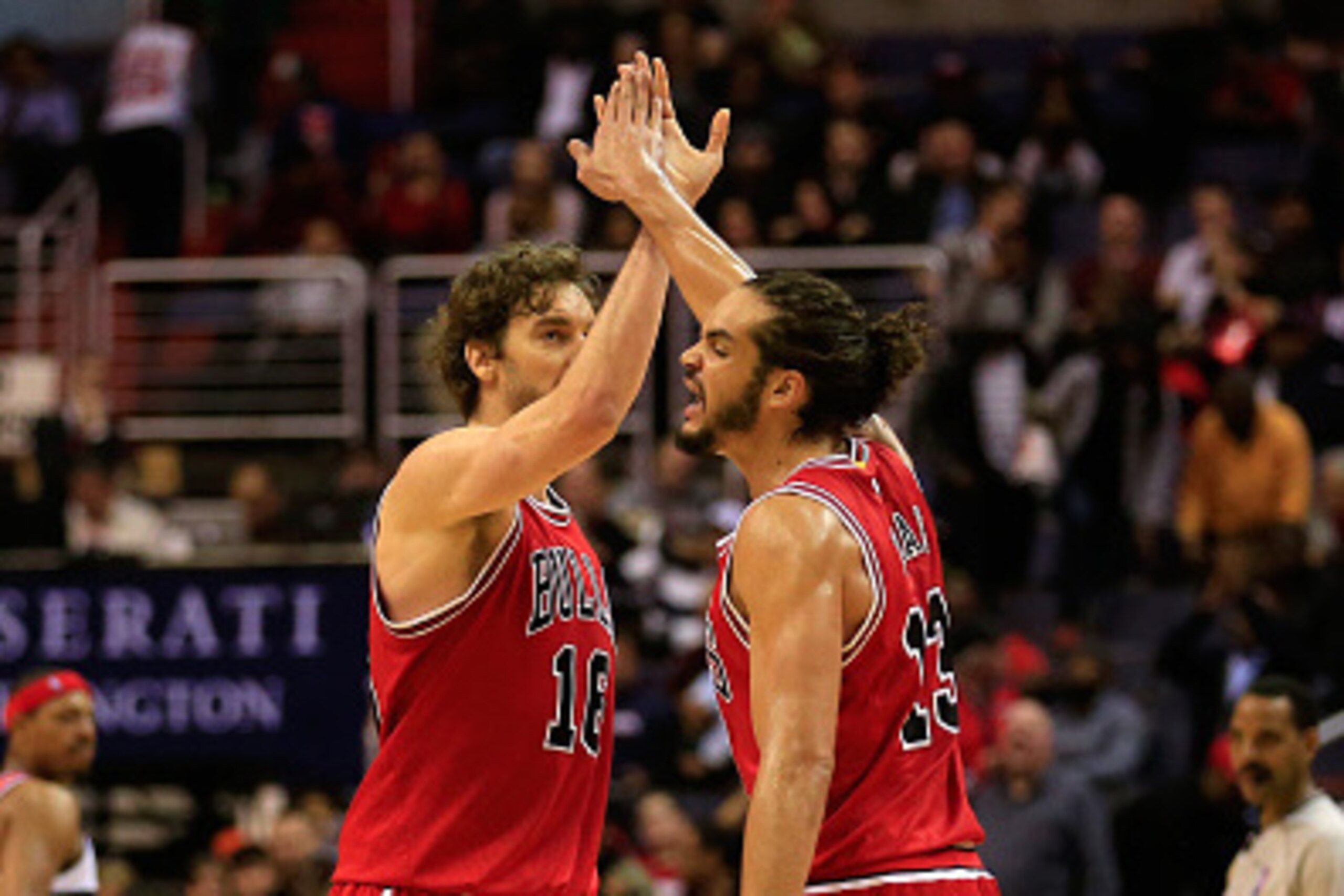 WASHINGTON, DC - DECEMBER 23: Pau Gasol #16 and Joakim Noah #13 of the Chicago Bulls celebrate following the Bulls 99-91 win over the Washington Wizards at Verizon Center on December 23, 2014 in Washington, DC. NOTE TO USER: User expressly acknowledges an