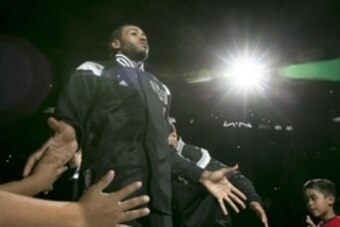 Jan 16, 2015; San Antonio, TX, USA; San Antonio Spurs small forward Kawhi Leonard (2) walks onto the court for player introductions before the game against the Portland Trail Blazers at AT&T Center. Mandatory Credit: Soobum Im-USA TODAY Sports