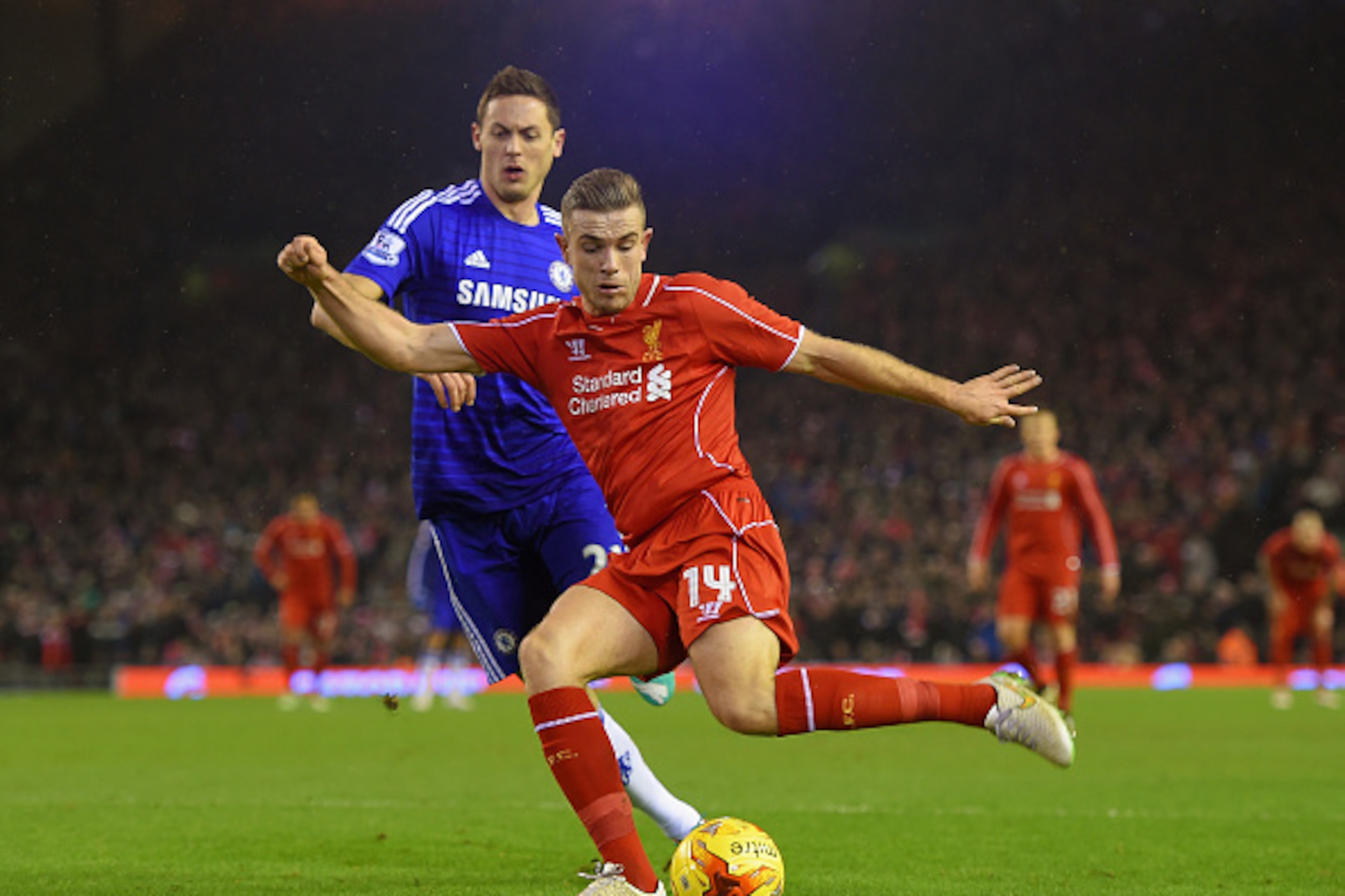 LIVERPOOL, ENGLAND - JANUARY 20: Jordan Henderson of Liverpool is closed down by Nemanja Matic of Chelsea during the Capital One Cup Semi-Final first leg match between Liverpool and Chelsea at Anfield on January 20, 2015 in Liverpool, England. (Photo by LIVERPOOL, ENGLAND - JANUARY 20: Jordan Henderson of Liverpool is closed down by Nemanja Matic of Chelsea during the Capital One Cup Semi-Final first leg match between Liverpool and Chelsea at Anfield on January 20, 2015 in Liverpool, England. (Photo by