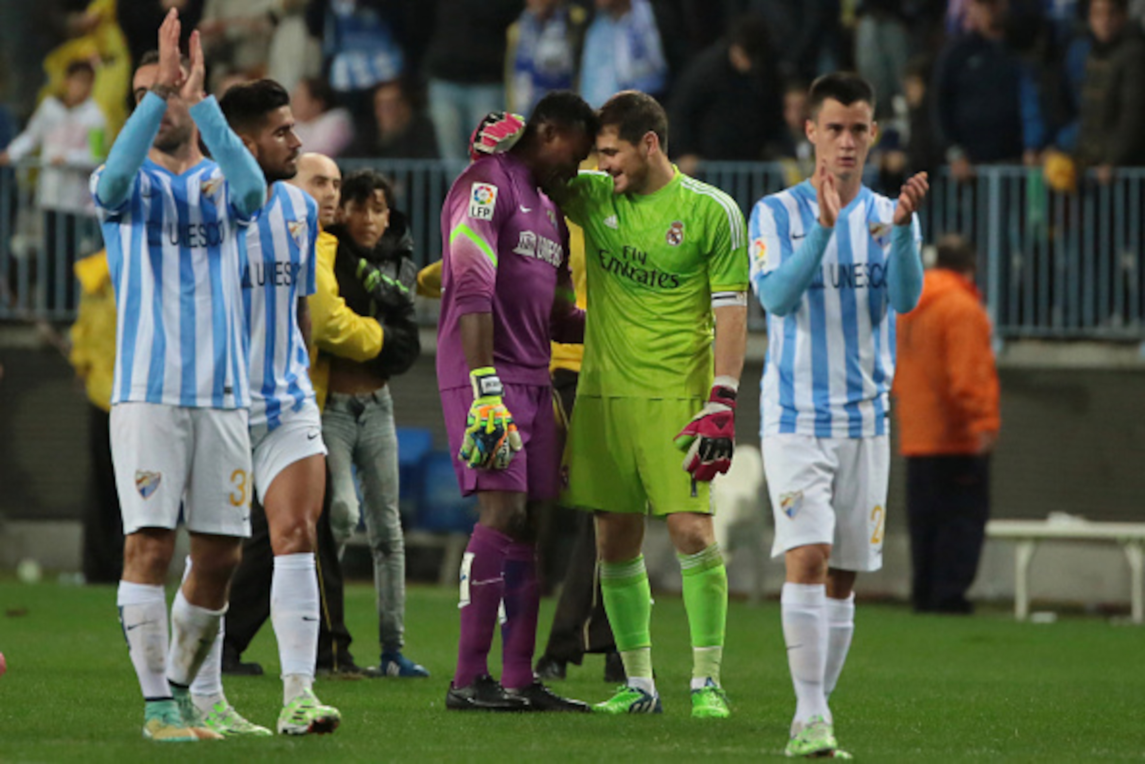 MALAGA, SPAIN - NOVEMBER 29: Goal keeper Carlos Kameni of Malaga CF greets goal keeper Iker Casillas of Real Madrid at the end of the La Liga match between Malaga CF and Real Madrid CF at La Rosaleda studium on November 29, 2014 in Malaga, Spain. (Photo MALAGA, SPAIN - NOVEMBER 29: Goal keeper Carlos Kameni of Malaga CF greets goal keeper Iker Casillas of Real Madrid at the end of the La Liga match between Malaga CF and Real Madrid CF at La Rosaleda studium on November 29, 2014 in Malaga, Spain. (Photo