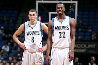 MINNEAPOLIS, MN - DECEMBER 8: Zach LaVine #8 and Andrew Wiggins #22 of the Minnesota Timberwolves stand on the court during a game against the Golden State Warriors on December 8, 2014 at Target Center in Minneapolis, Minnesota. NOTE TO USER: User express