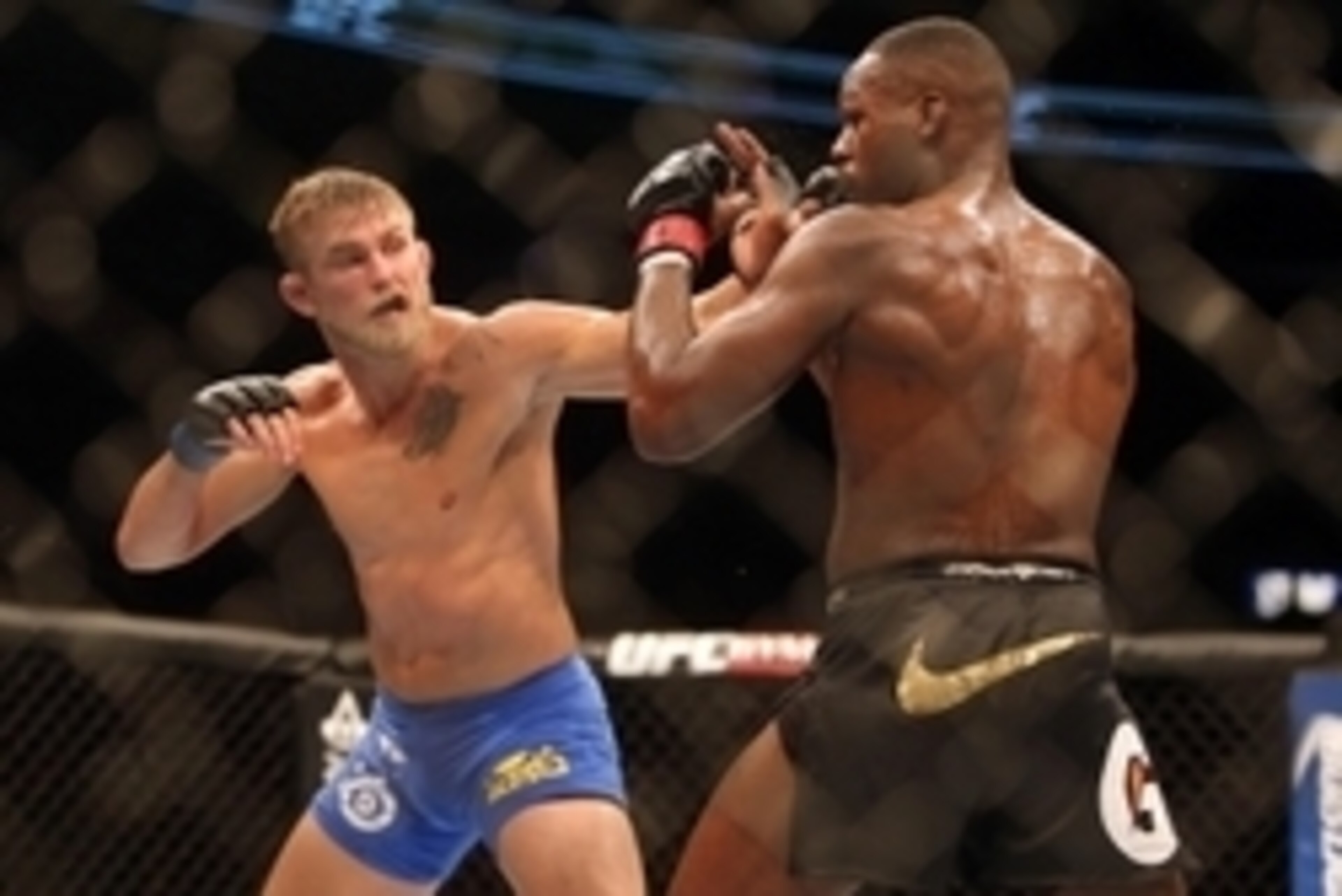 Sep 21, 2013; Toronto, Ontario, CAN; Alexander Gustafsson (left) fights Jon Jones during their Light Heavyweight Championship bout at UFC 165 at the Air Canada Centre. Mandatory Credit: Tom Szczerbowski-USA TODAY Sports