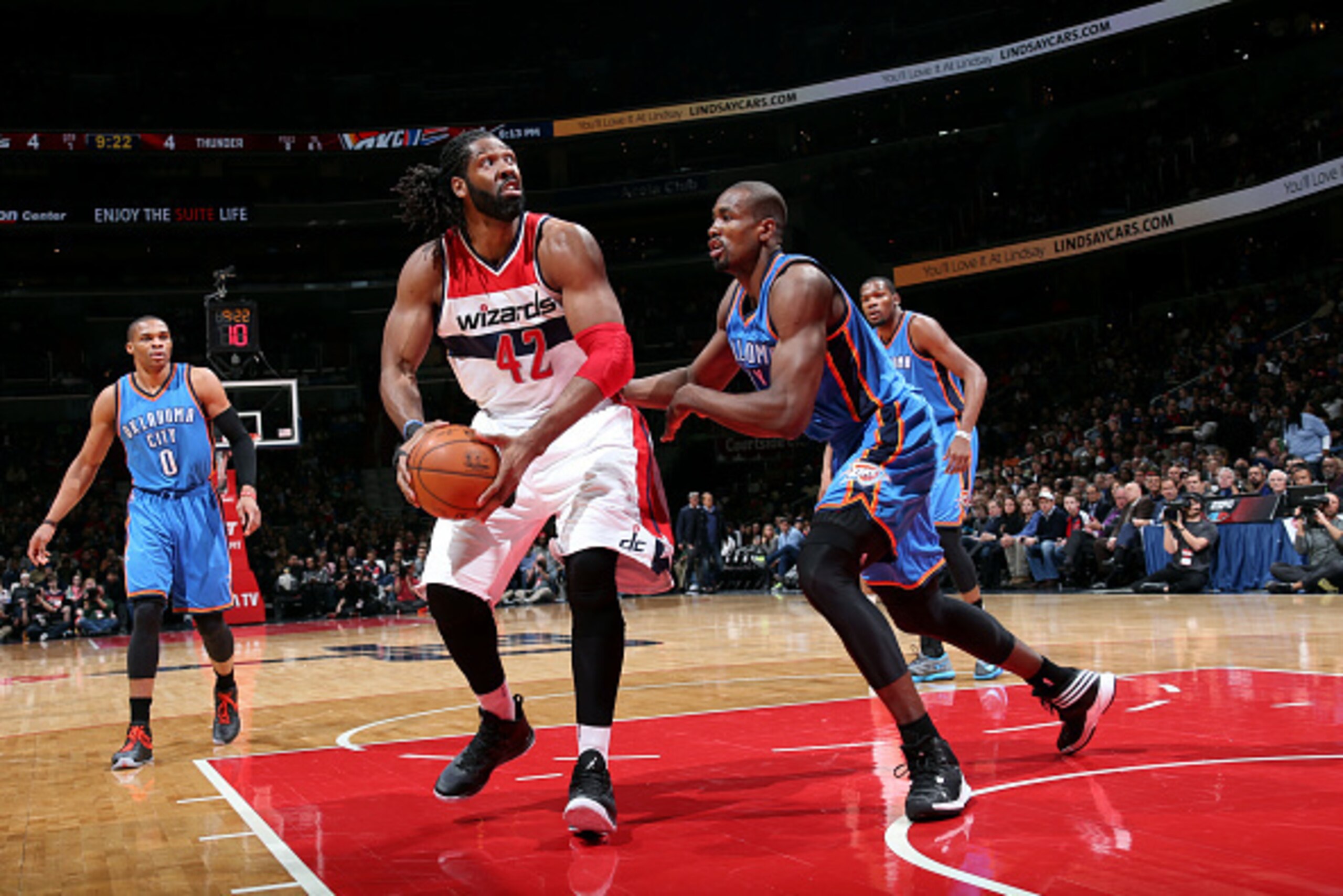 WASHINGTON, DC - JANUARY 21: Nene Hilario #42 of the Washington Wizards handles the ball against Serge Ibaka #9 of the Oklahoma City Thunder on January 21, 2015 at Verizon Center in Washington, DC. NOTE TO USER: User expressly acknowledges and agrees tha WASHINGTON, DC - JANUARY 21: Nene Hilario #42 of the Washington Wizards handles the ball against Serge Ibaka #9 of the Oklahoma City Thunder on January 21, 2015 at Verizon Center in Washington, DC. NOTE TO USER: User expressly acknowledges and agrees tha
