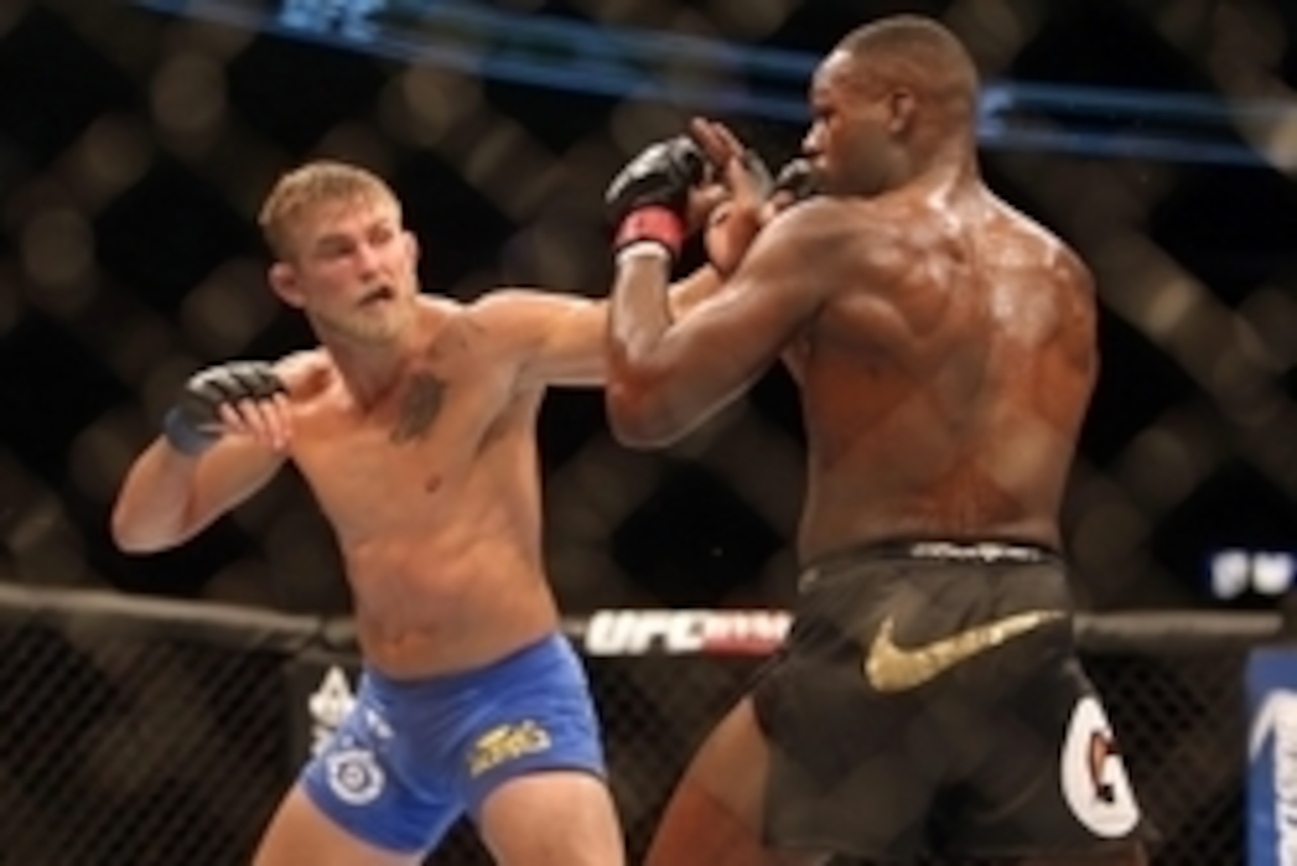 Sep 21, 2013; Toronto, Ontario, CAN; Alexander Gustafsson (left) fights Jon Jones during their Light Heavyweight Championship bout at UFC 165 at the Air Canada Centre. Mandatory Credit: Tom Szczerbowski-USA TODAY Sports