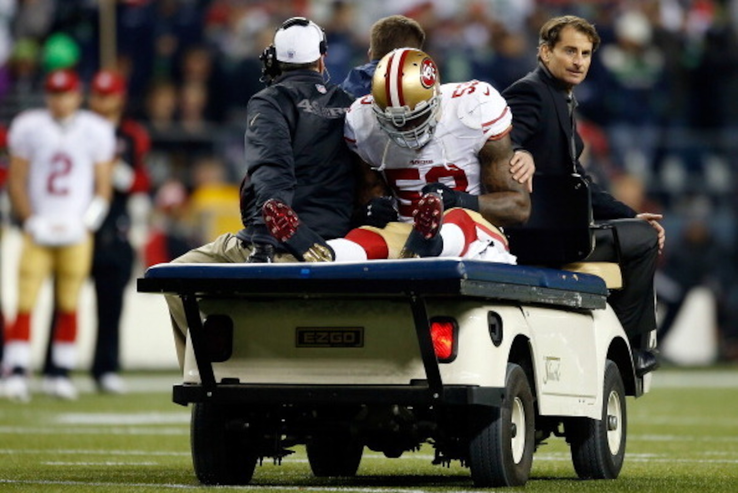 SEATTLE, WA - JANUARY 19: Linebacker NaVorro Bowman #53 of the San Francisco 49ers is carted off the field in the fourth quarter against the Seattle Seahawks during the 2014 NFC Championship at CenturyLink Field on January 19, 2014 in Seattle, Washington SEATTLE, WA - JANUARY 19: Linebacker NaVorro Bowman #53 of the San Francisco 49ers is carted off the field in the fourth quarter against the Seattle Seahawks during the 2014 NFC Championship at CenturyLink Field on January 19, 2014 in Seattle, Washington
