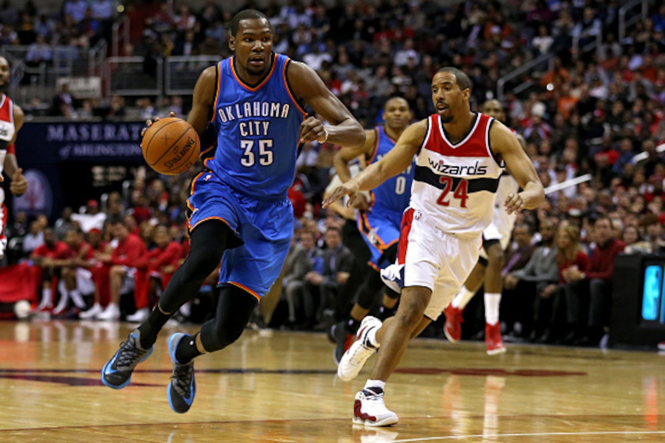 WASHINGTON, DC - JANUARY 21: Kevin Durant #35 of the Oklahoma City Thunder dribbles past Andre Miller #24 of the Washington Wizards in the first half at Verizon Center on January 21, 2015 in Washington, DC. NOTE TO USER: User expressly acknowledges and ag WASHINGTON, DC - JANUARY 21: Kevin Durant #35 of the Oklahoma City Thunder dribbles past Andre Miller #24 of the Washington Wizards in the first half at Verizon Center on January 21, 2015 in Washington, DC. NOTE TO USER: User expressly acknowledges and ag