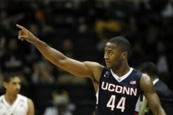 Jan 6, 2015; Tampa, FL, USA; Connecticut Huskies guard Rodney Purvis (44) points against the South Florida Bulls during the second half at USF Sun Dome. Connecticut Huskies defeated the South Florida Bulls 58-44. Mandatory Credit: Kim Klement-USA TODAY Sp