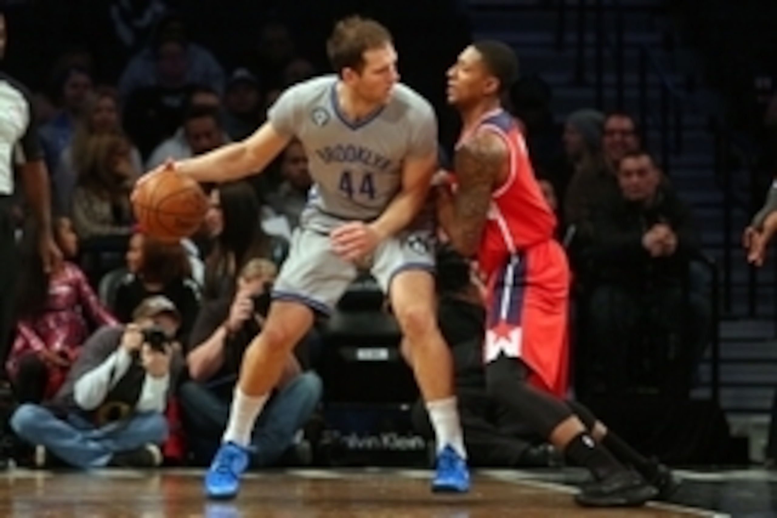 Jan 17, 2015; Brooklyn, NY, USA; Brooklyn Nets shooting guard Bojan Bogdanovic (44) controls the ball against Washington Wizards shooting guard Bradley Beal (3) during the first quarter at Barclays Center. Mandatory Credit: Brad Penner-USA TODAY Sports