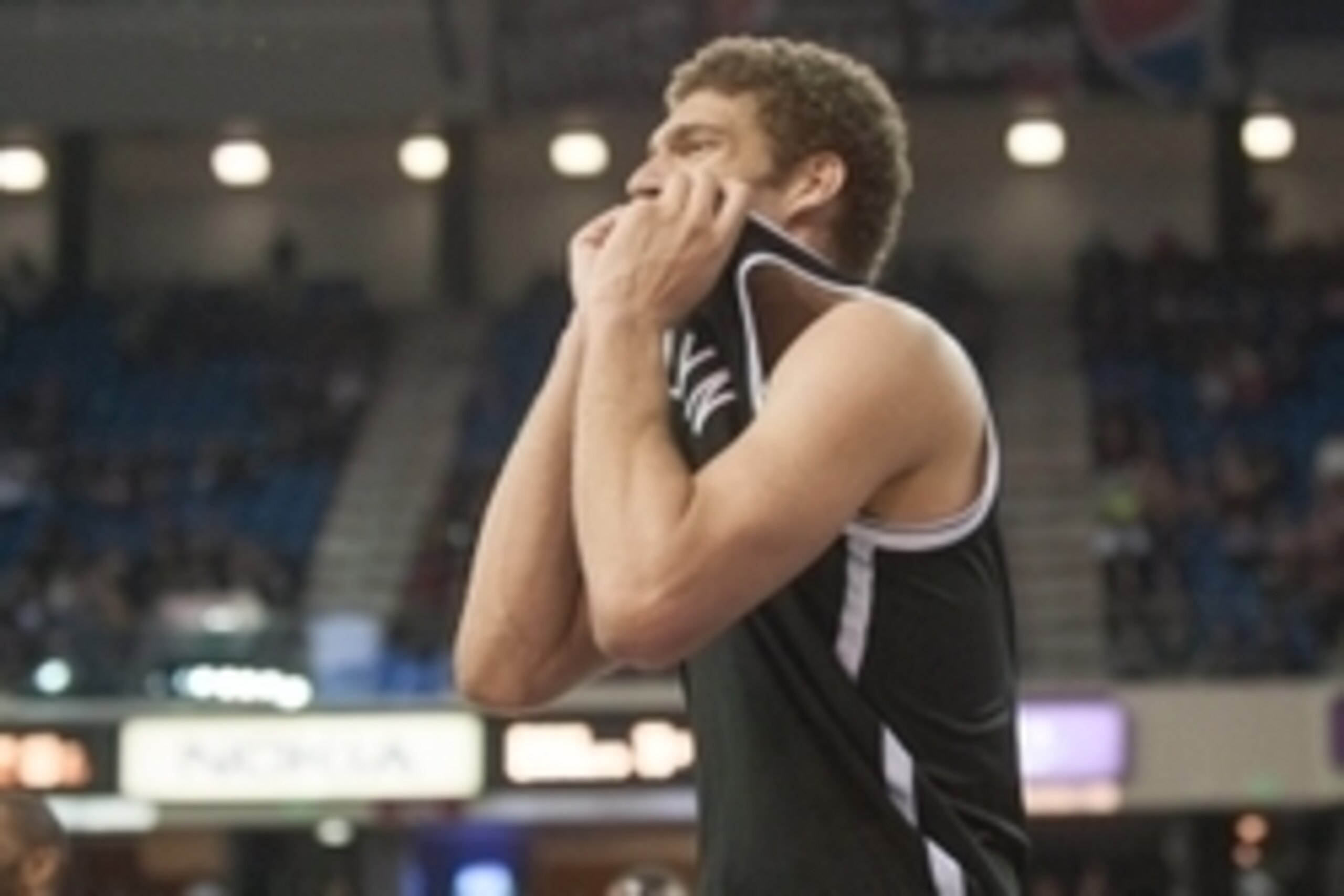 Jan 21, 2015; Sacramento, CA, USA; Brooklyn Nets center Brook Lopez (11) reacts to a call during the fourth quarter against the Sacramento Kings at Sleep Train Arena. The Nets won 103-100. Mandatory Credit: Ed Szczepanski-USA TODAY Sports