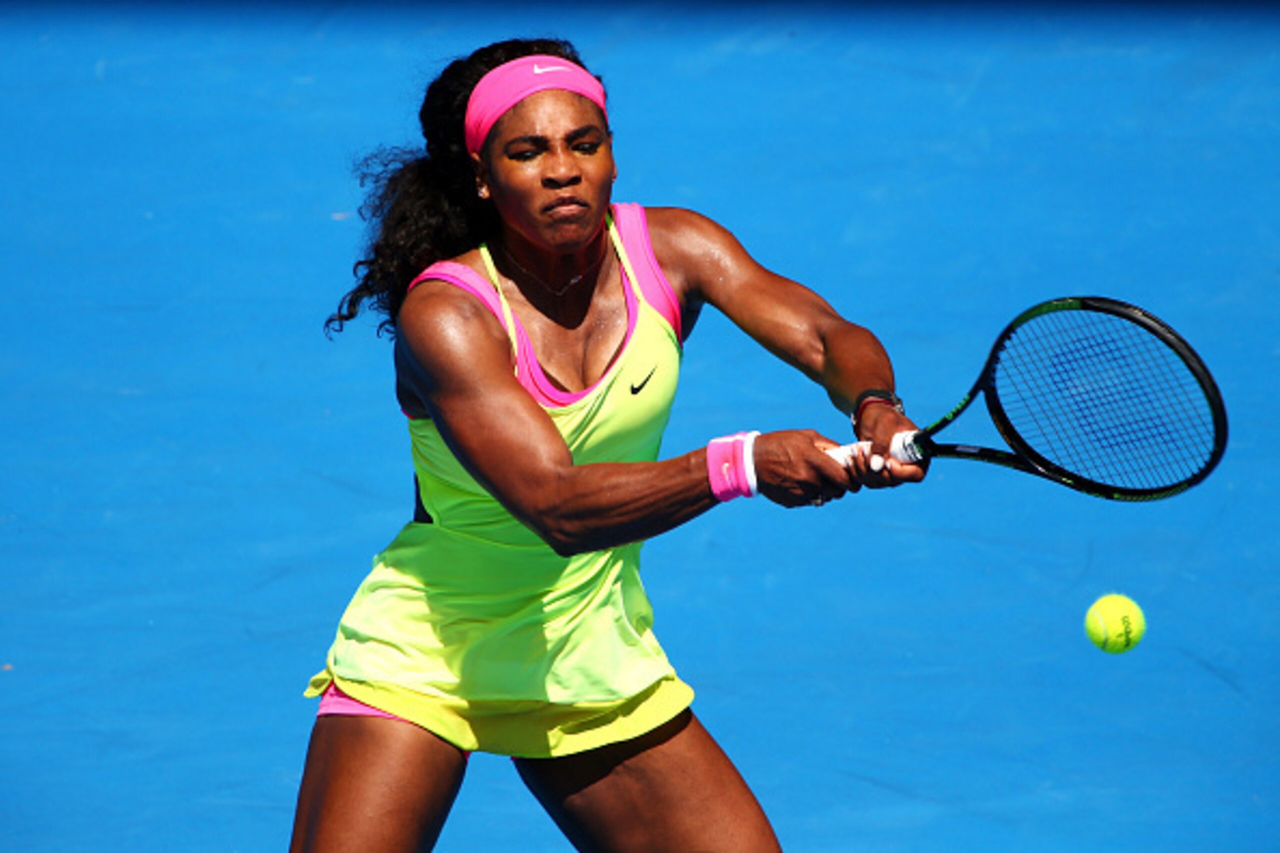 MELBOURNE, AUSTRALIA - JANUARY 22:  Serena Williams of the United States plays a backhand in her second round match against Vera Zvonareva of Russia during day four of the 2015 Australian Open at Melbourne Park on January 22, 2015 in Melbourne, Australia.