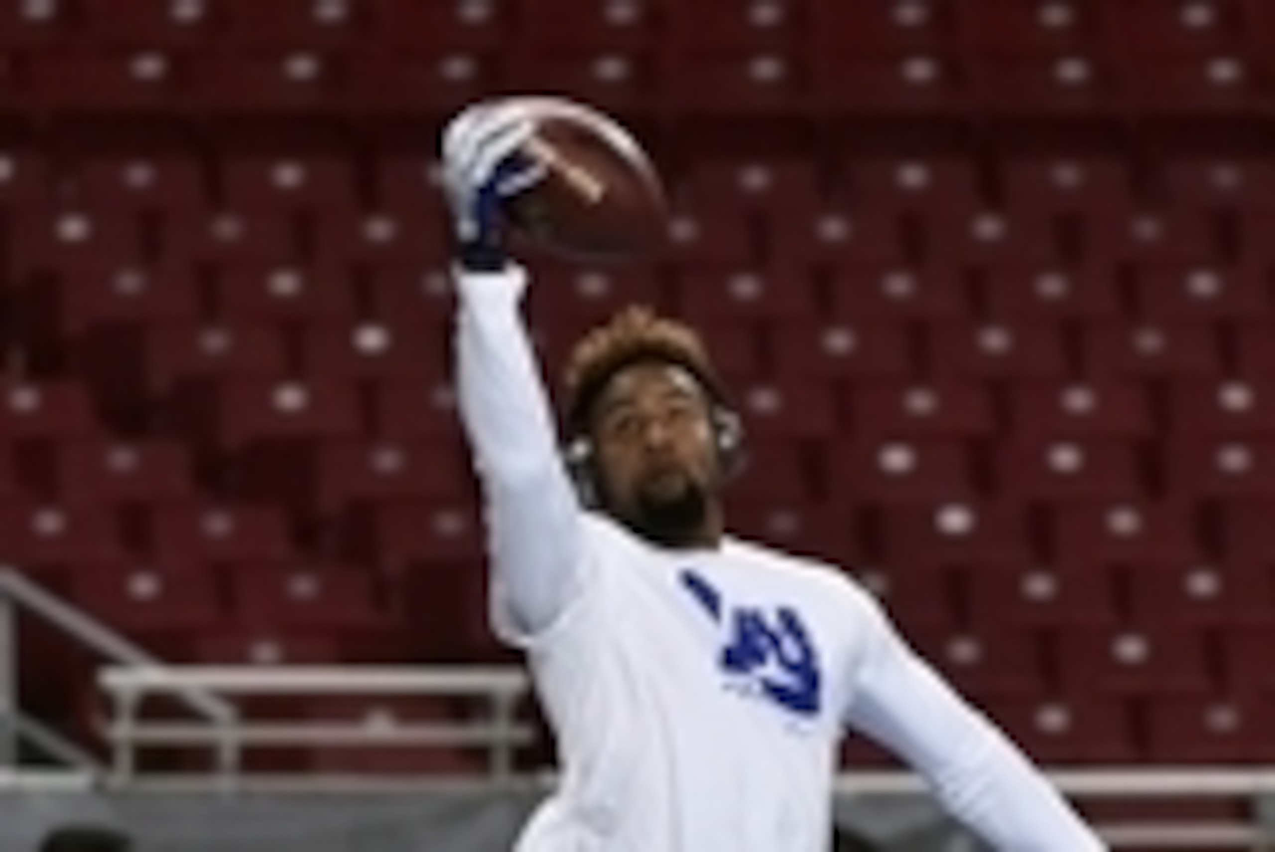 Dec 21, 2014; St. Louis, MO, USA; New York Giants wide receiver Odell Beckham warms up before the game between the St. Louis Rams and the New York Giants at the Edward Jones Dome. Mandatory Credit: Jasen Vinlove-USA TODAY Sports