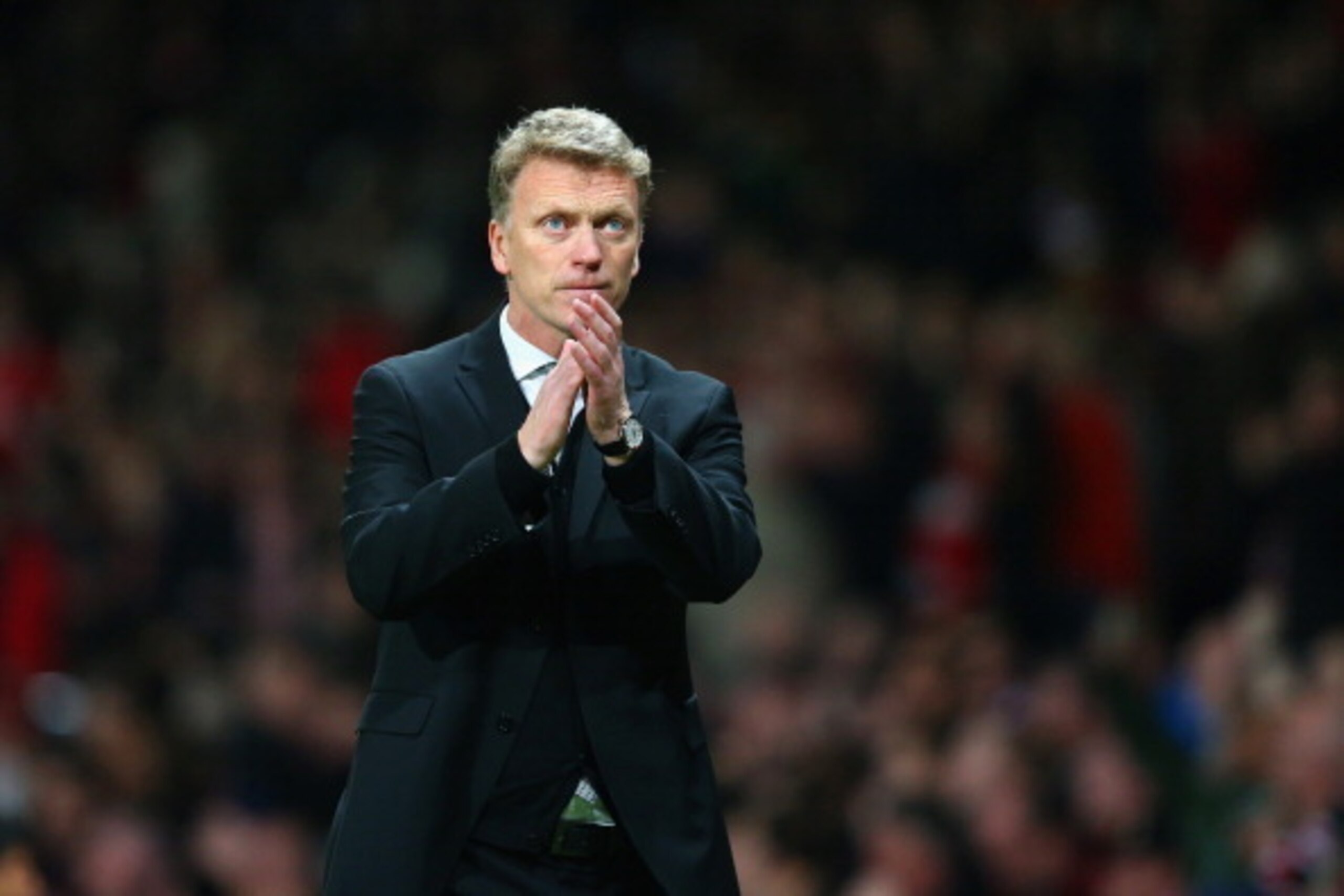 MANCHESTER, ENGLAND - APRIL 01: David Moyes manager of Manchester United applauds the fans during the UEFA Champions League Quarter Final first leg match between Manchester United and FC Bayern Muenchen at Old Trafford on April 1, 2014 in Manchester, En MANCHESTER, ENGLAND - APRIL 01: David Moyes manager of Manchester United applauds the fans during the UEFA Champions League Quarter Final first leg match between Manchester United and FC Bayern Muenchen at Old Trafford on April 1, 2014 in Manchester, En