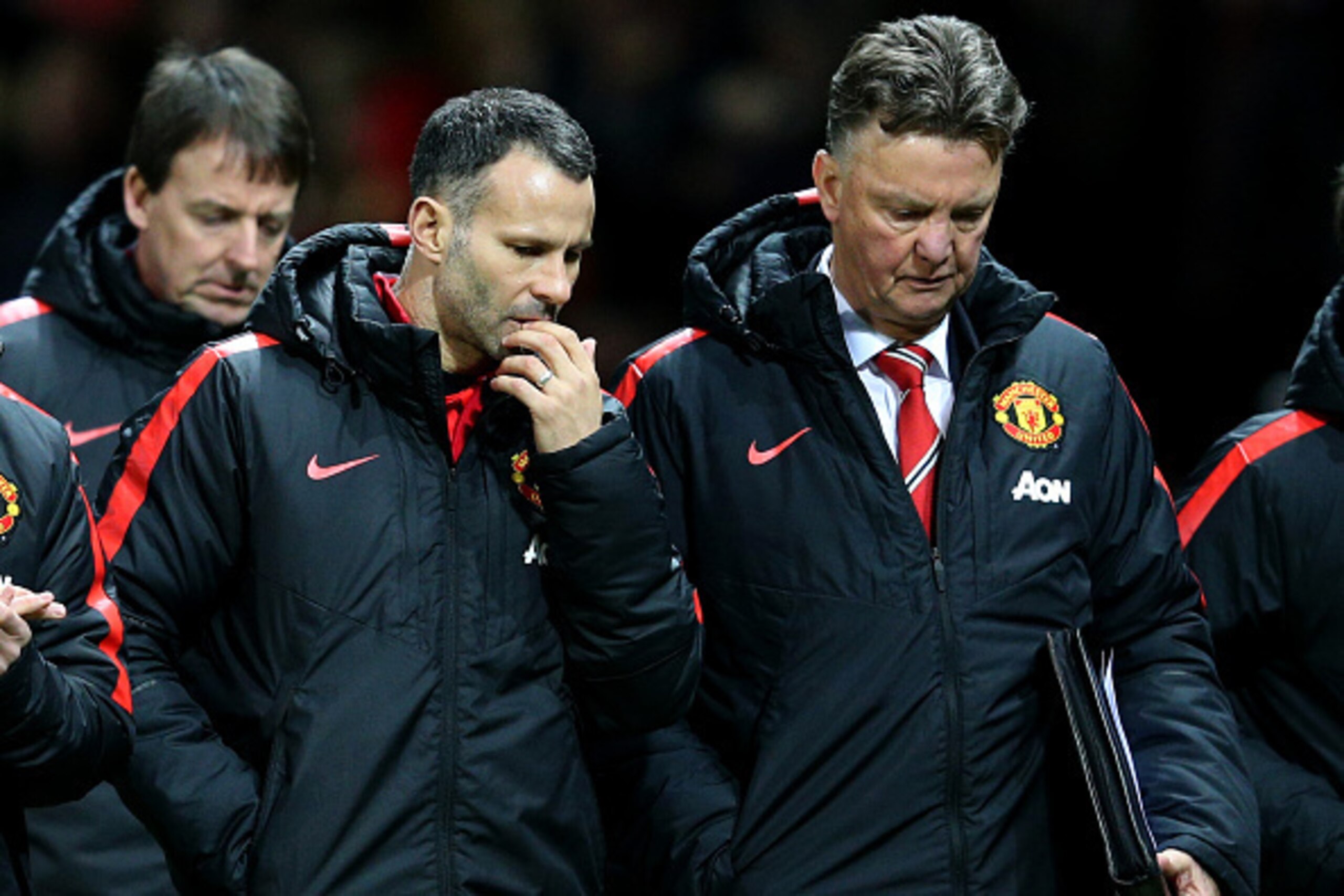 MANCHESTER, ENGLAND - JANUARY 11: Louis van Gaal, manager of Manchester United speaks with his assistant Ryan Giggs sa they leave the pitch at half-time during the Barclays Premier League match between Manchester United and Southampton at Old Trafford on MANCHESTER, ENGLAND - JANUARY 11: Louis van Gaal, manager of Manchester United speaks with his assistant Ryan Giggs sa they leave the pitch at half-time during the Barclays Premier League match between Manchester United and Southampton at Old Trafford on