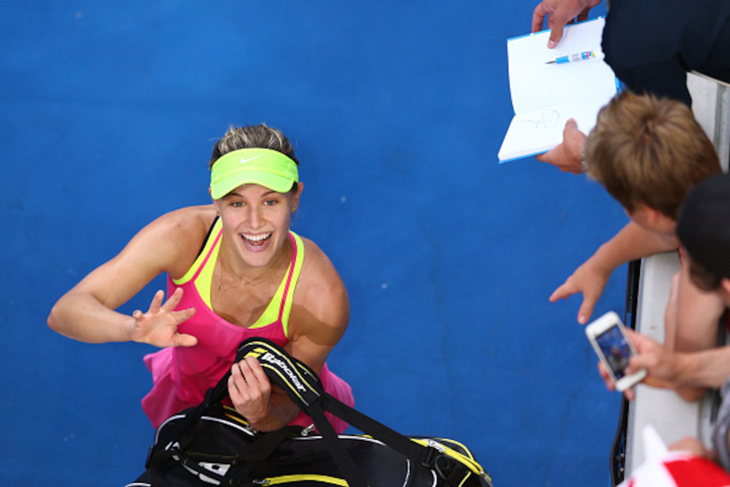 MELBOURNE, AUSTRALIA - JANUARY 21:  Eugenie Bouchard of Canada celebrates winning her second round match against Kiki Bertens of the Netherlands during day three of the 2015 Australian Open at Melbourne Park on January 21, 2015 in Melbourne, Australia.  (