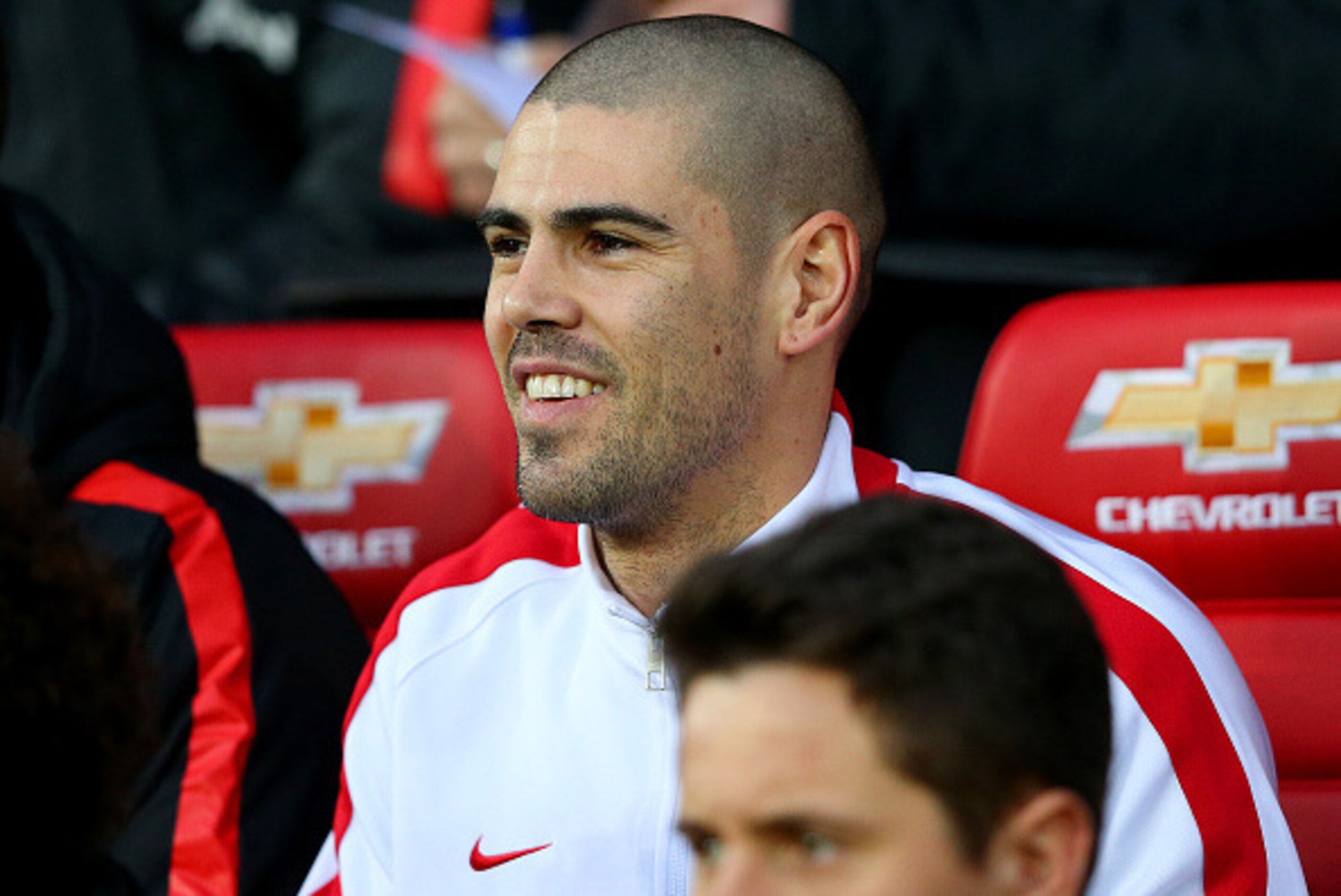 MANCHESTER, ENGLAND - JANUARY 11:  Victor Valdes of Manchester United sits on the bench before the Barclays Premier League match between Manchester United and Southampton at Old Trafford on January 11, 2015 in Manchester, England.  (Photo by Alex Livesey/