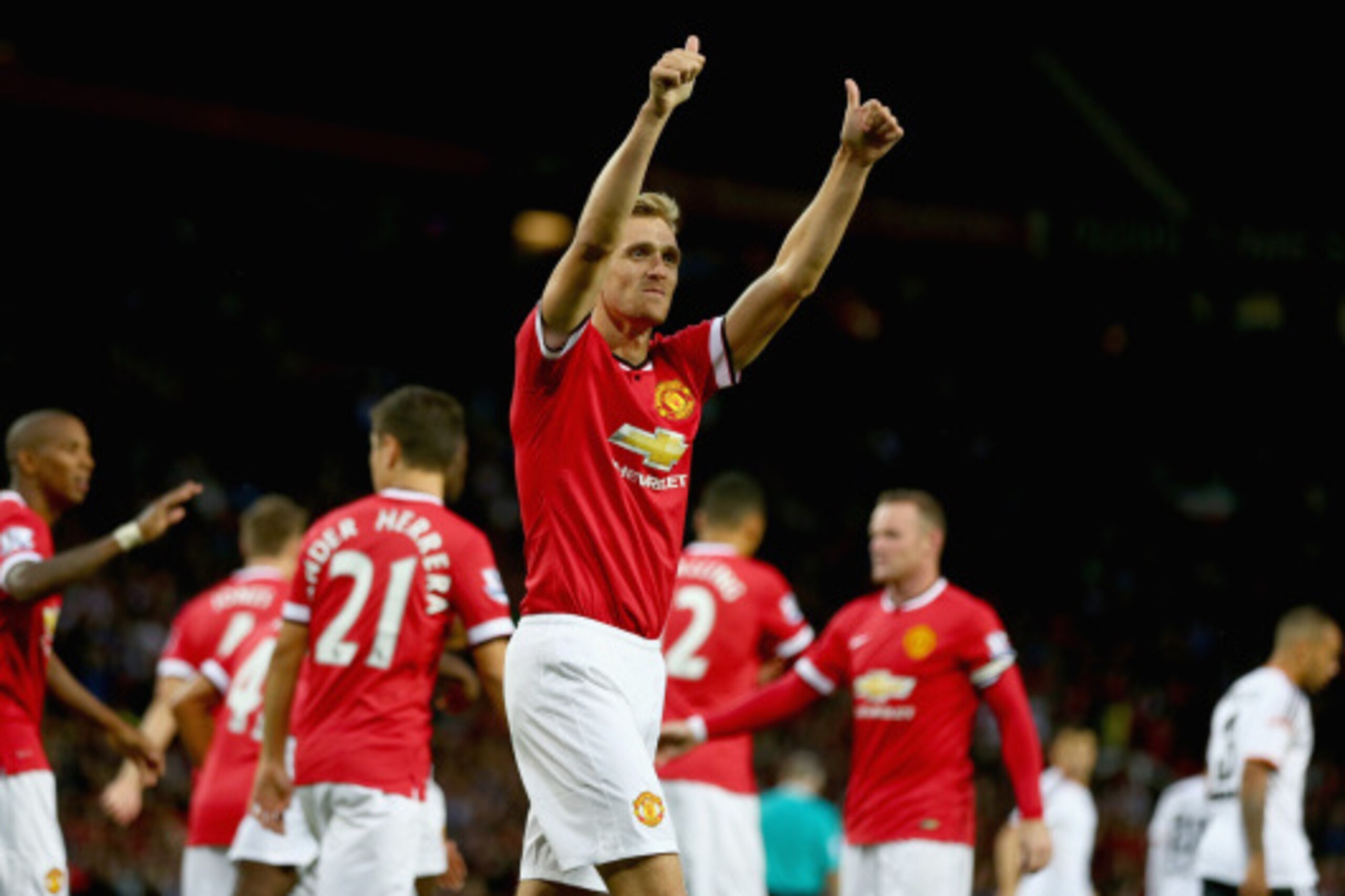 MANCHESTER, ENGLAND - AUGUST 12: Darren Fletcher of Manchester United celebrates scoring the first goal during the Pre Season Friendly match between Manchester United and Valencia at Old Trafford on August 12, 2014 in Manchester, England.  (Photo by Clive